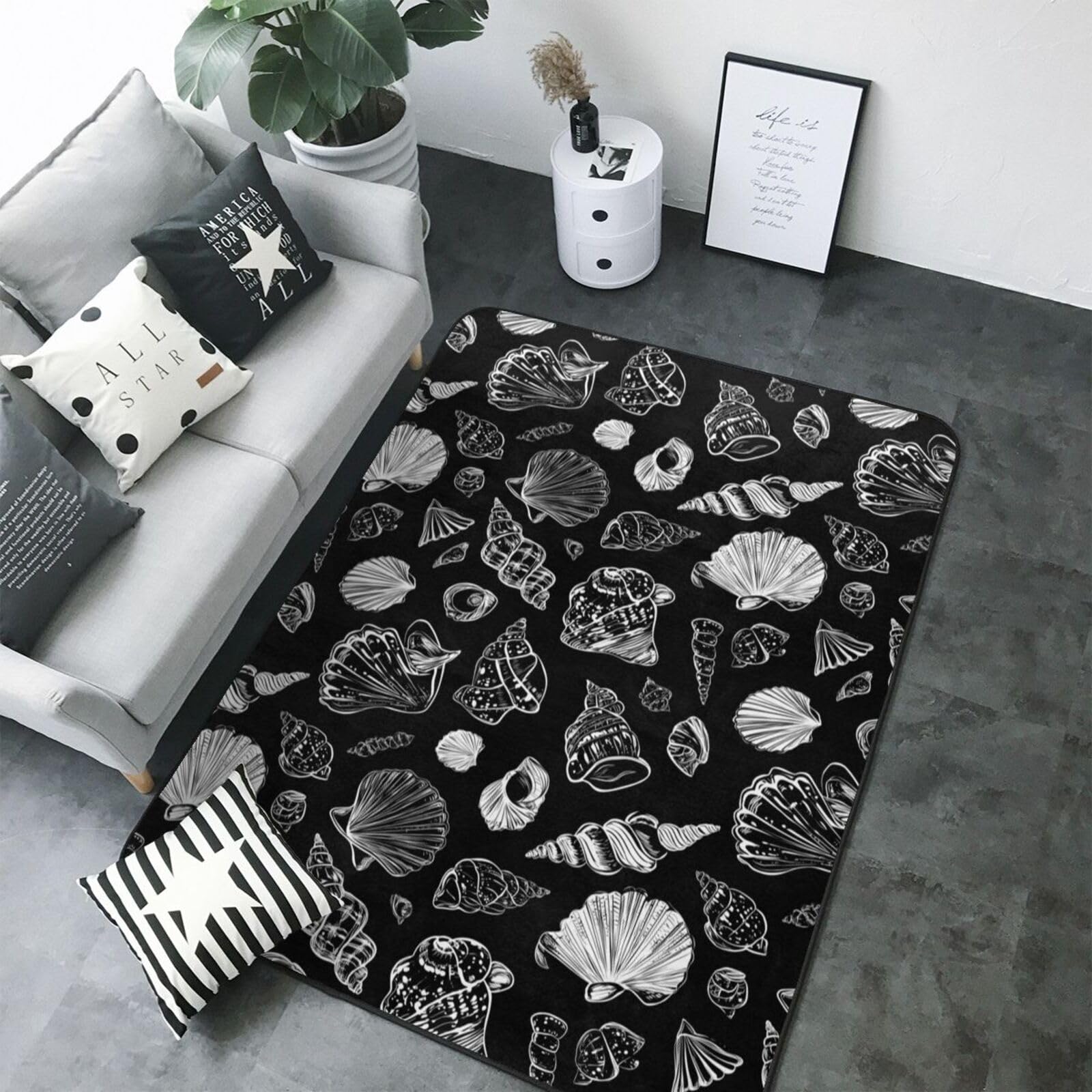 Tapis lavable grand format noir motif coquilles pour salon et bureau