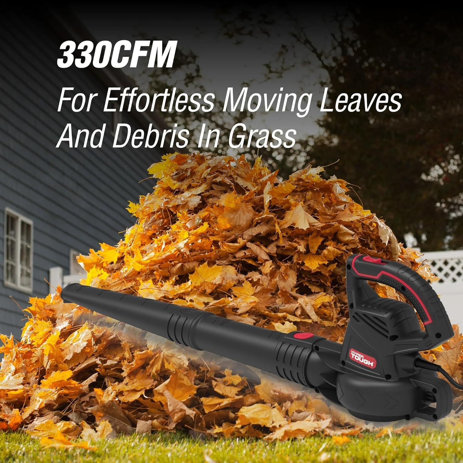 Blower moving leaves in grass