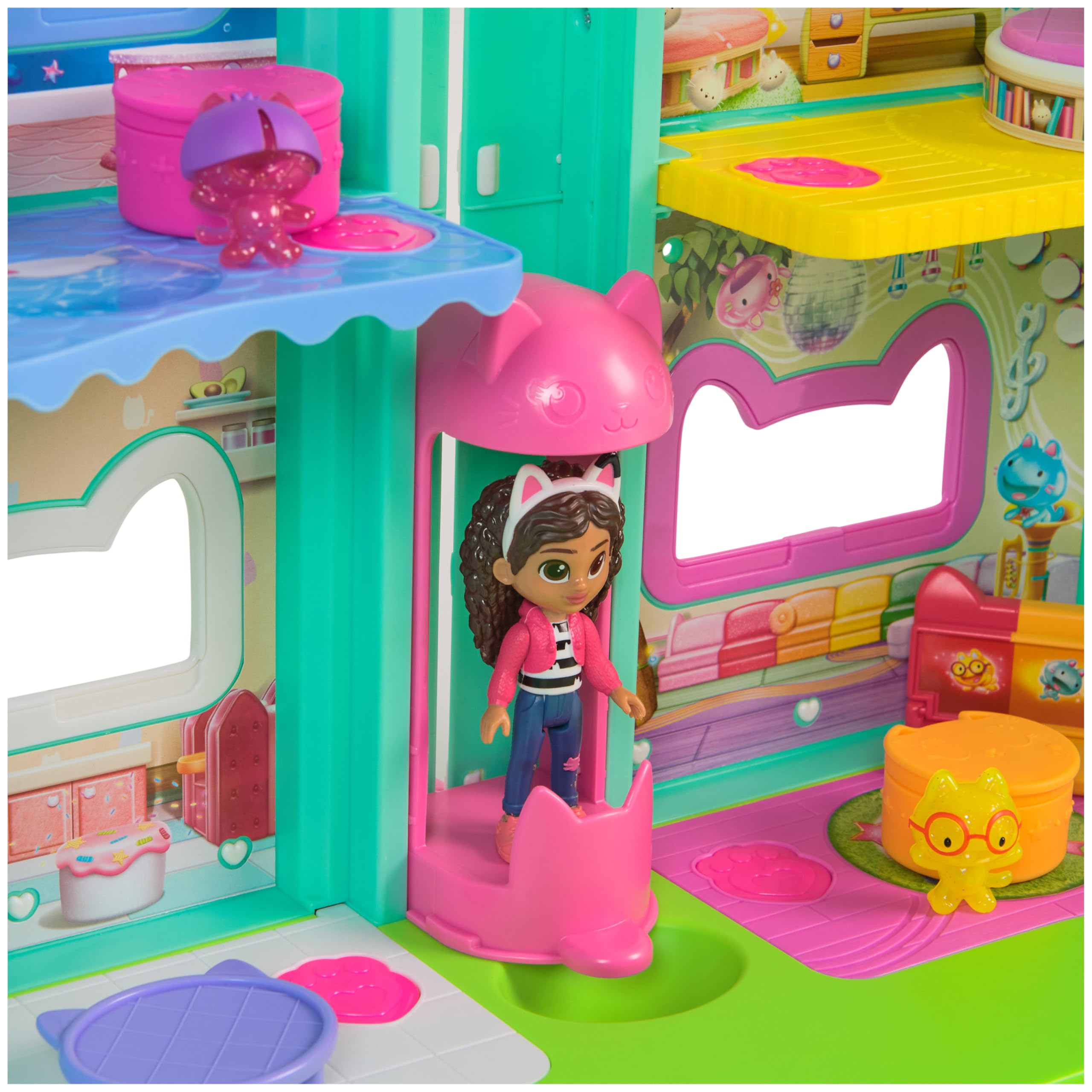 Close-up of the Gabby's Dollhouse: The Movie, Meow-Mazing Interactive Dollhouse showing the LCD screen eyes and animated character.