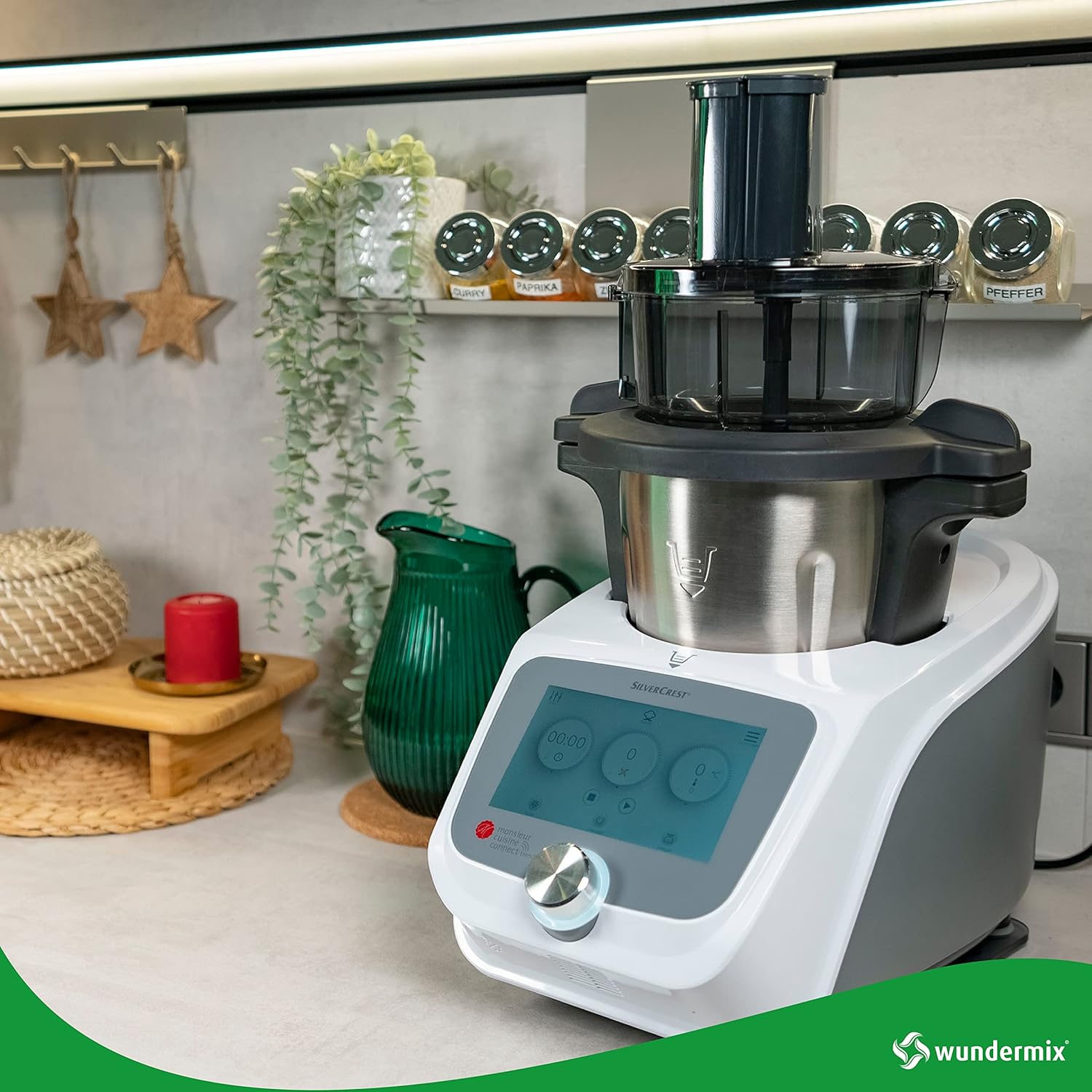 Wundermix WunderSlicer attached to a Monsieur Cuisine food processor, demonstrating compatibility.