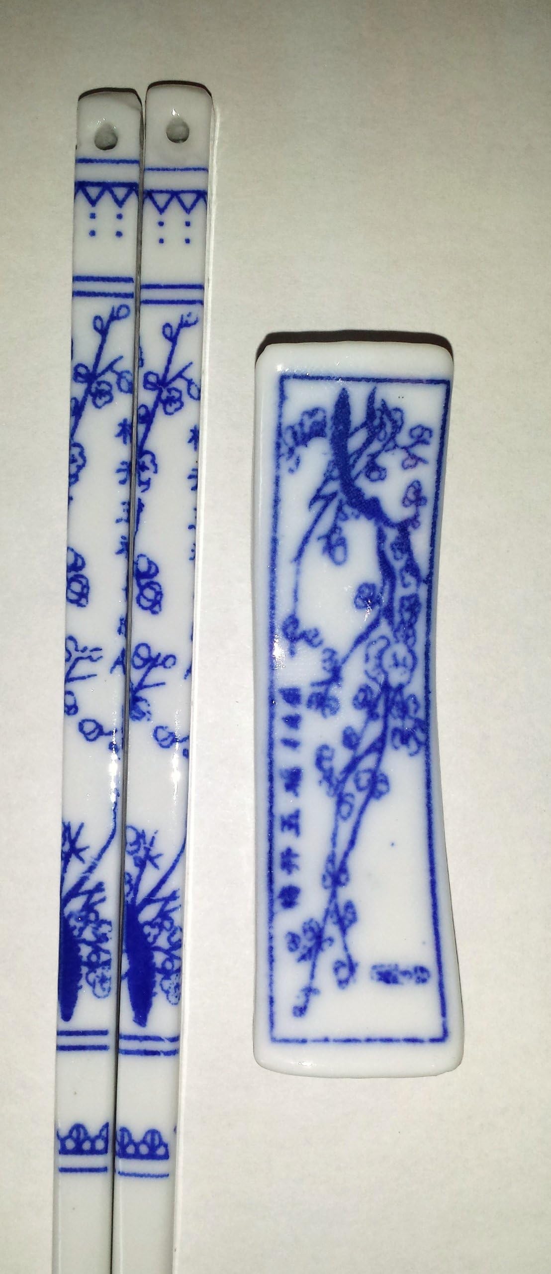 Set of Porcelain Chopsticks with Matching Rest Fired with Small Cobalt Blue Floral Design Service for 4