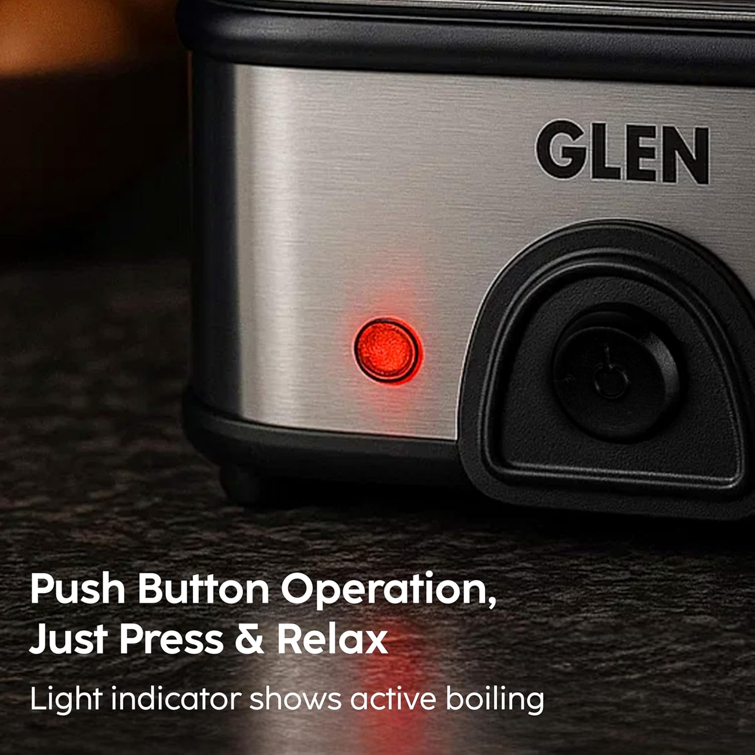 Close-up of the Glen Electric Egg Boiler Machine's power button and indicator light