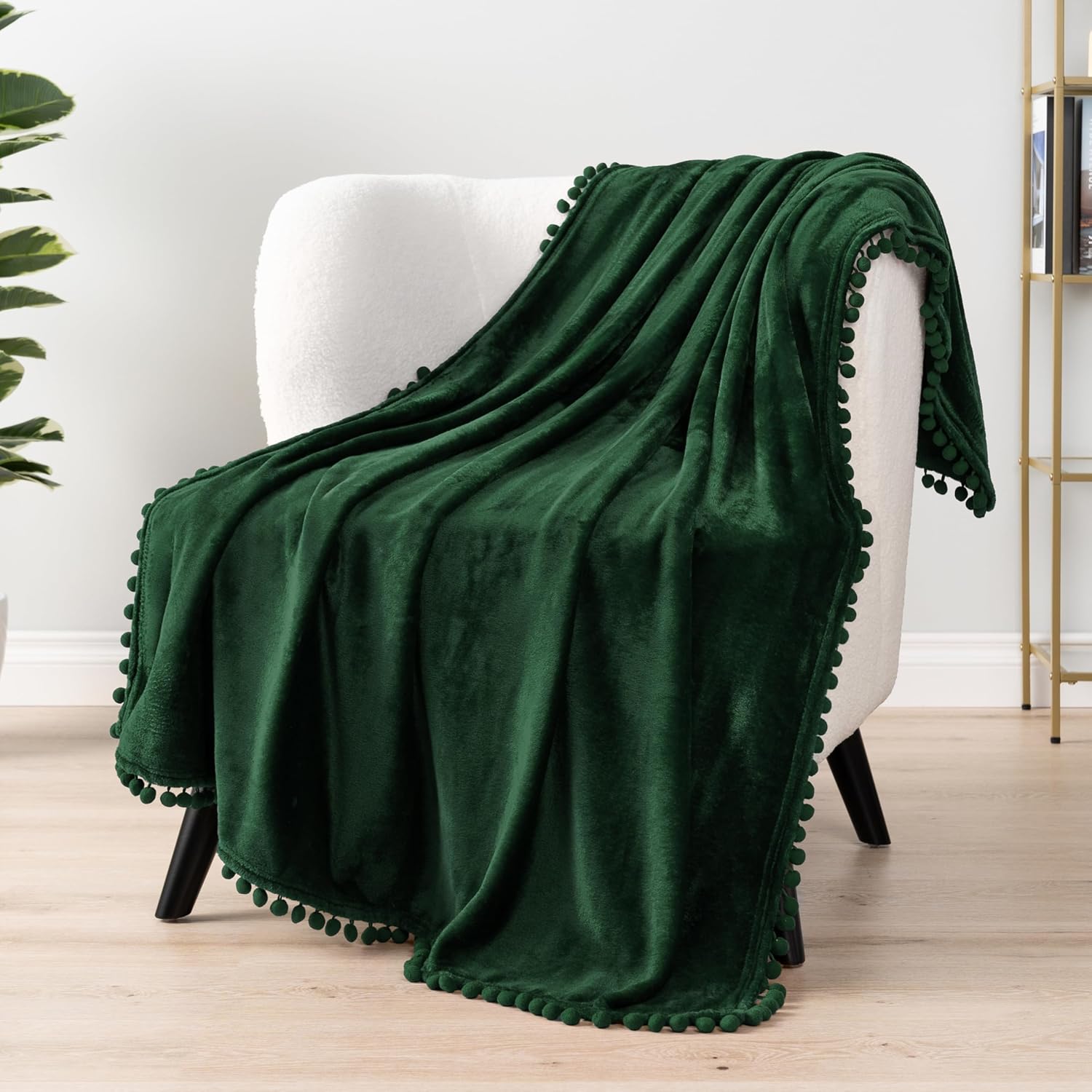 PAVILIA Fleece Throw Blanket for Couch with Pom Pom Fringe, Emerald Green, Soft Cozy Fuzzy Flannel Blanket for Sofa Bed, Lightweight Plush All Season Throw, 50x60 Inches