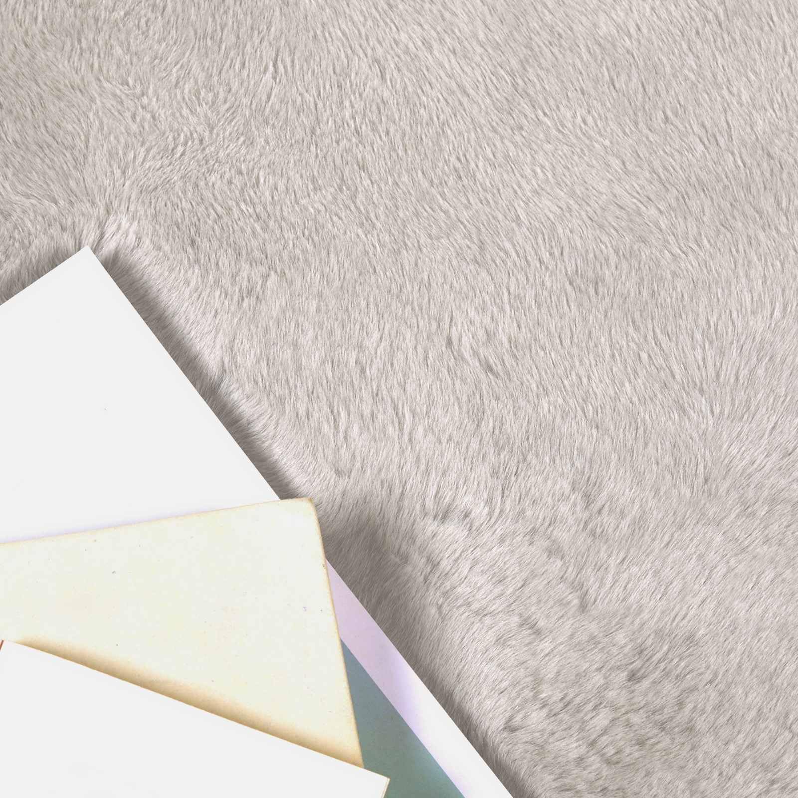 Tapis antidérapant en fausse de lapin OLITE beige contre sols froids
