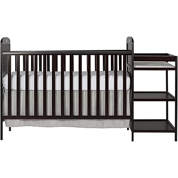 crib and changing table in one