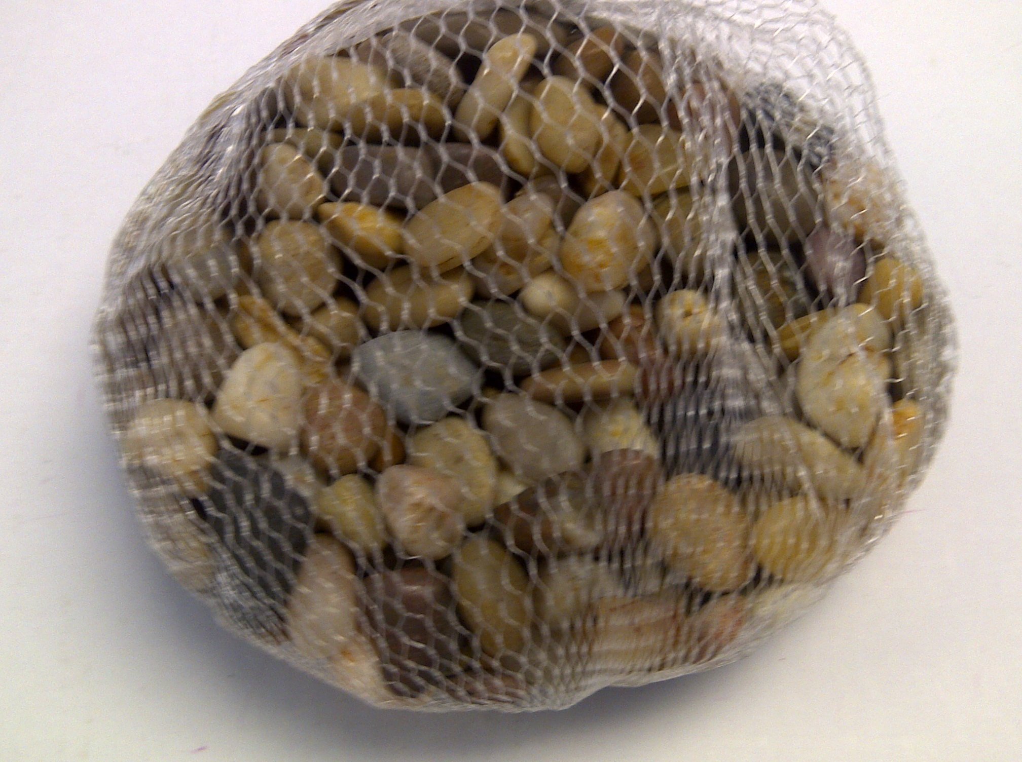 TBC Pebbles: Beautiful Assorted Polished Small River Rocks (Pebbles). Assorted Colors and Sizes. Use as Vase Fillers, Table Scatters, Great in Fireplace, in Floral Arrangements, Aquariums, with Candles. Use Wet or Dry. Great for Eye Catching Centerpiece. Perfect for Indoor or Outdoor Gardens, Containers, Fountains & Spas. 20 Ounce Bag.