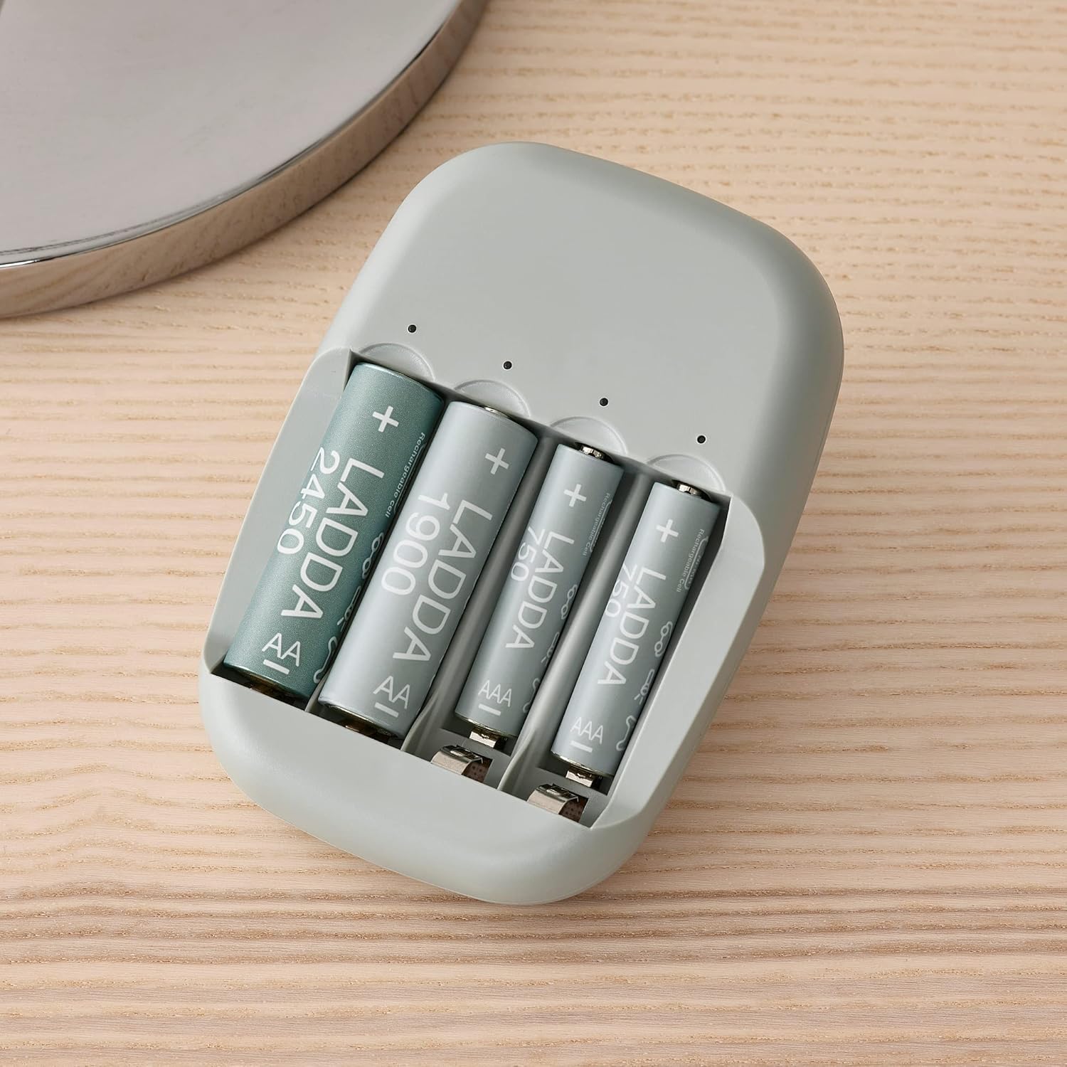 IKEA STENKOL Battery Charger with four AA batteries inserted