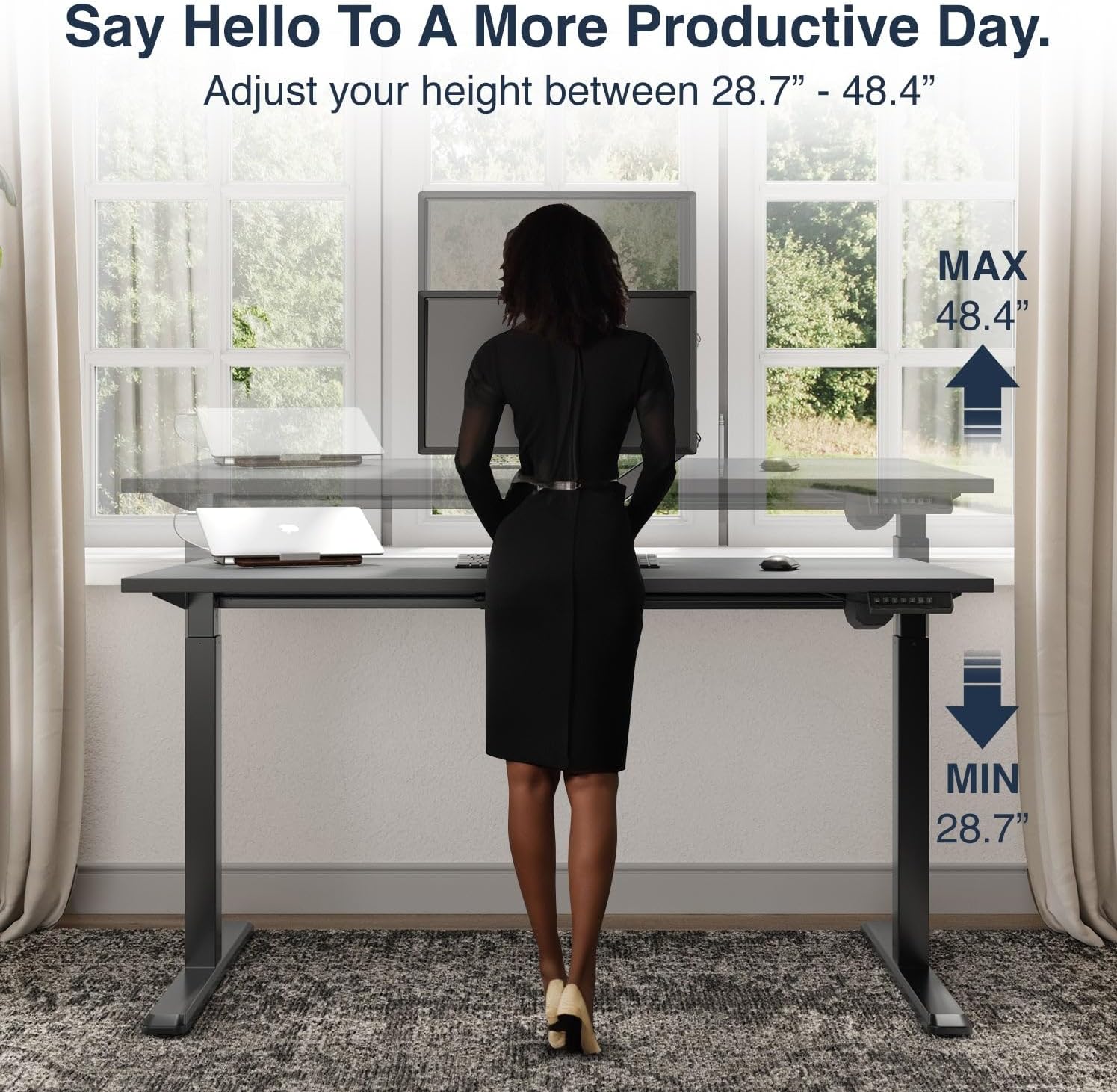 Woman standing at a Desky Single Sit Stand Desk, illustrating adjustable height from 28.7 to 48.4 inches.