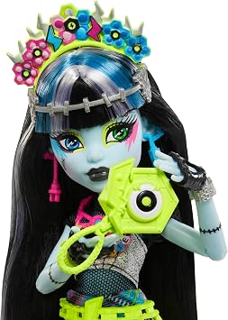 Monster High Frankie Stein Doll with Glamorous Monster Festival Outfit and Festival Accessories such as Sacks Ribbon Poster Statement Bag and More HXH79