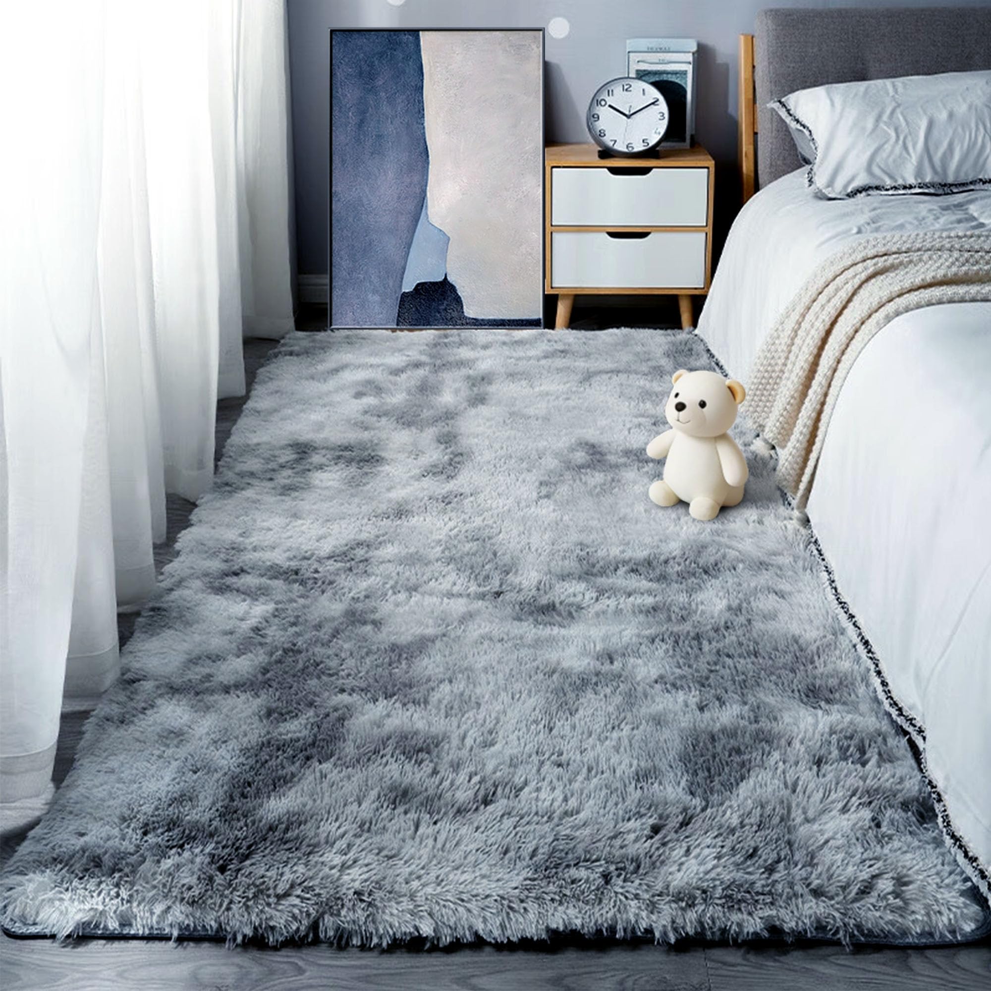 Tapis salon grand format gris clair pour réchauffer un sol froid