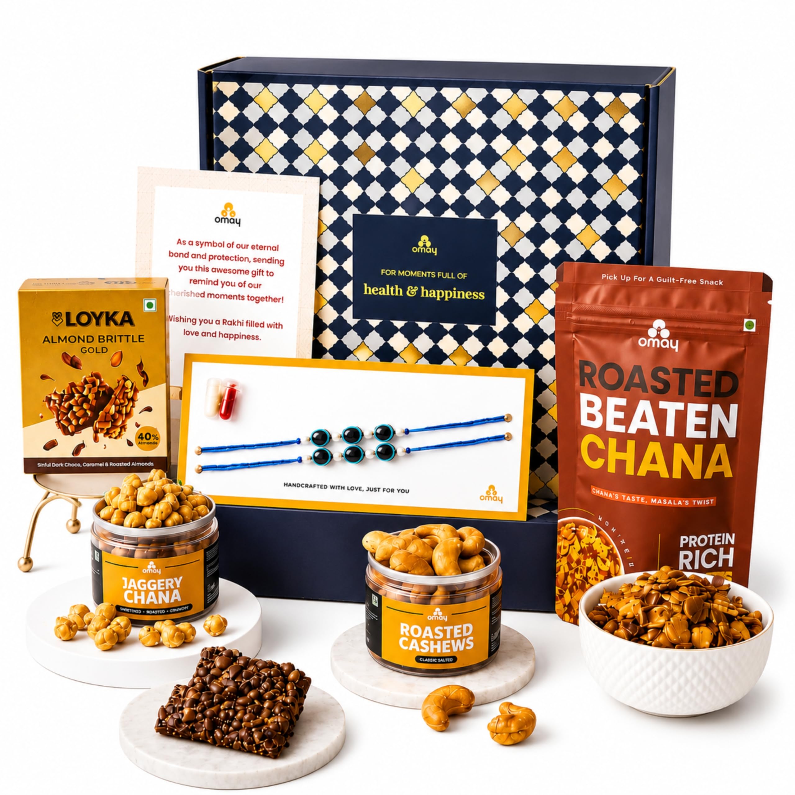 Omay Foods Snack & Celebrate Rakhi Gift Hamper for Brother | 8 Pcs | Healthy Roasted Snacks, Dry Fruits, Chocolate & Handmade Rakhi | Rakhi Box for Bhai and Bhaiya