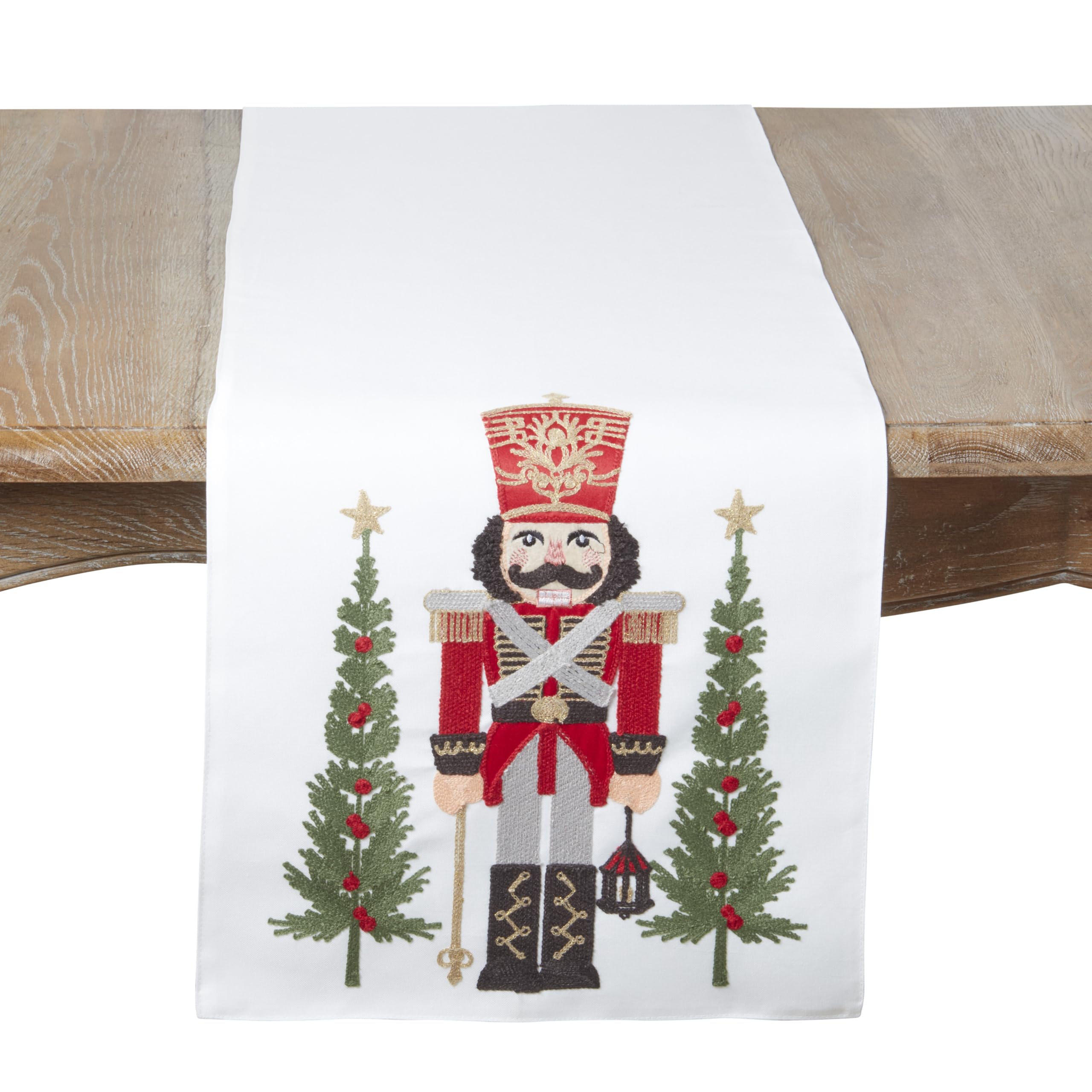 SARO LIFESTYLE Nutcracker Christmas Table Runner - Festive Holiday Table Runner with Embroidered Nutcracker and Evergreen Tree Design for Holiday Dining Tables, 16"x70", White