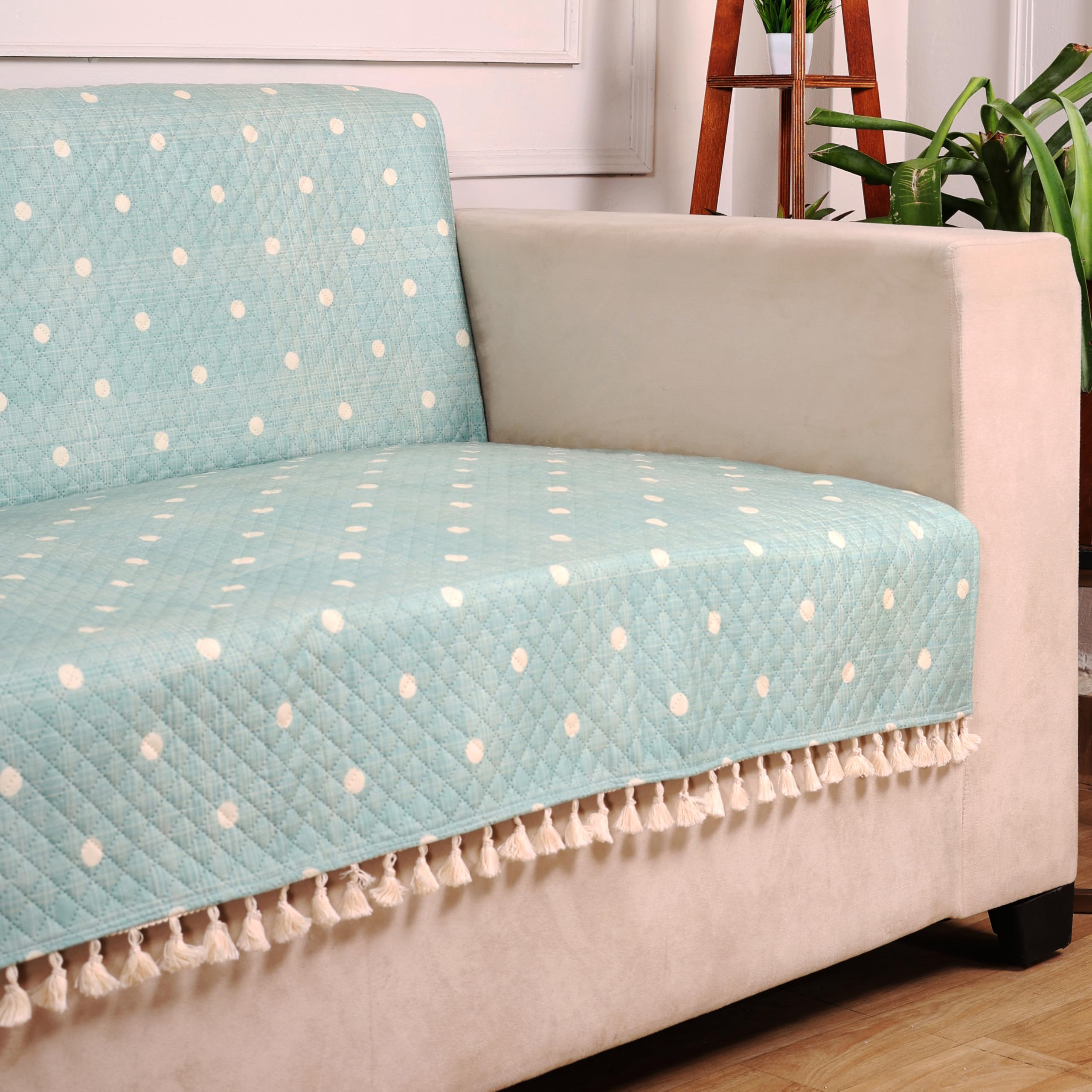 STITCHNEST Quilted Velvet Sofa Cover with Tassels – 24x60 Inch, Pastel Green with White Polka Dots, Soft & Playful, Washable Sofa Protector for 1-Seater