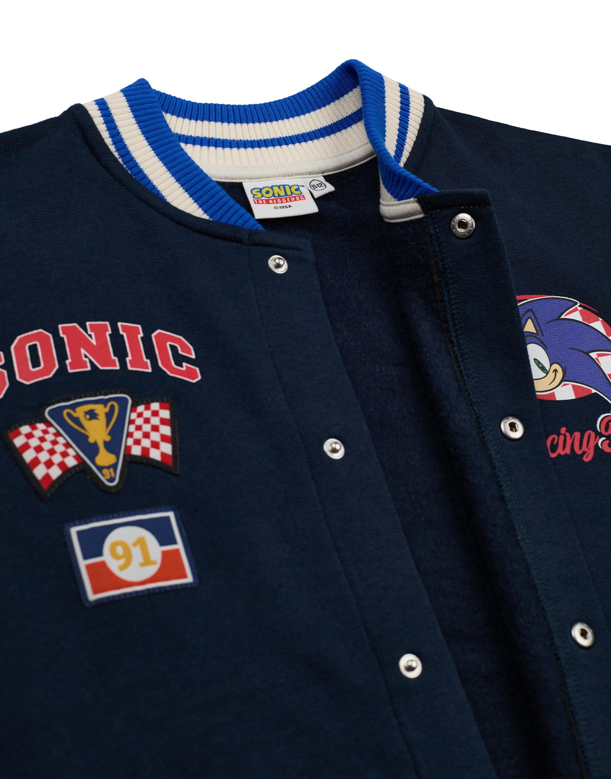 Sonic The Hedgehog Chaqueta bomber para niños| Chaqueta universitaria Sonic Racing Team para niños en Azul | Chaqueta de béisbol con cremallera y estampado de bandera a cuadros del personaje Sonic