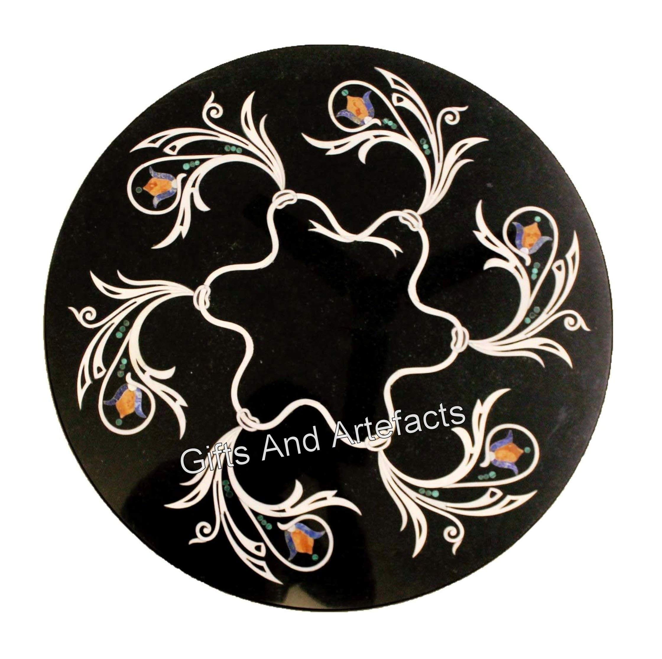 Table basse ronde marbre noir : la solution gain de place pour canapé étroit
