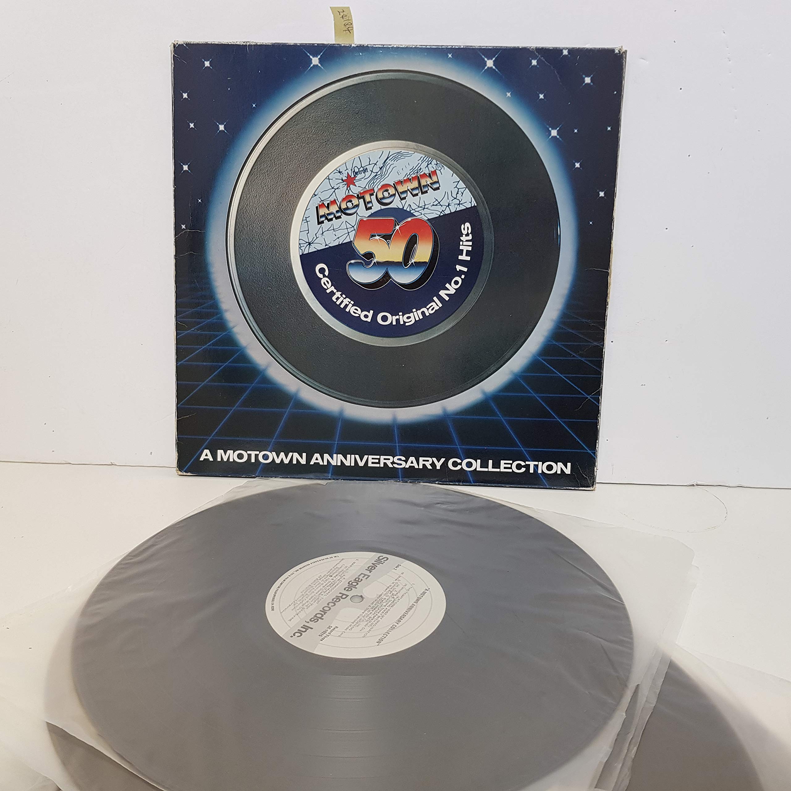 50 MOTOWN CERTIFIED ORIGINAL No.1 HITS, A MOTOWN ANNIVERSARY COLLECTION. Featuring Diana Ross, The Miracles, Smokey Robinson, Michael Jackson, Mary Wells, etc etc. SE10215. 5 X 12" vinyl LP
