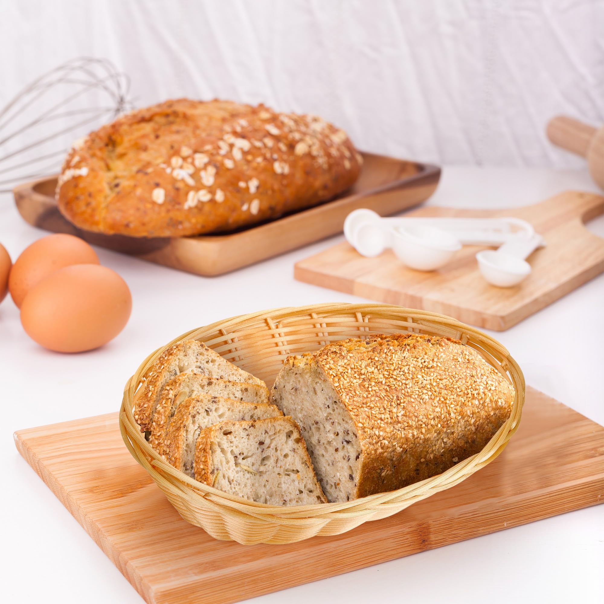 Lot de 12 petites corbeilles à pain ovales en plastique tressé - 22 x 17 x 6 cm - Panier de service en imitation rotin pour cuisine, restaurant, centre de table