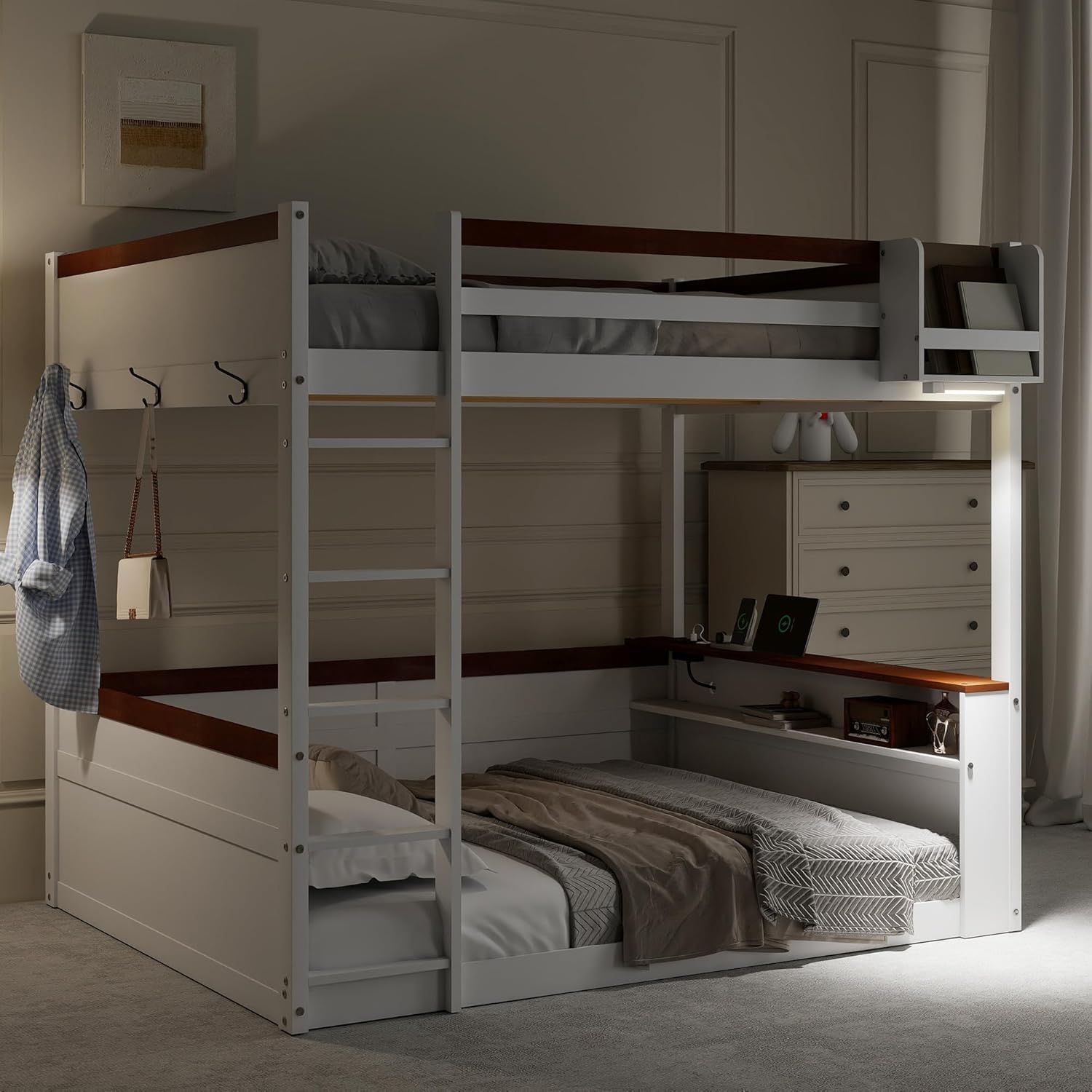 The bunk bed illuminated by its integrated LED light, showcasing the lower bed's desk area.