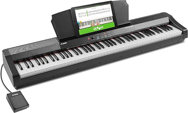 Alesis Recital Grand  Pianino cyfrowe z 88 pełnowymiarowymi klawiszami ważonymi ze stopniowanym mechanizmem młotkowym, 16 brzmieniami i głośnikami