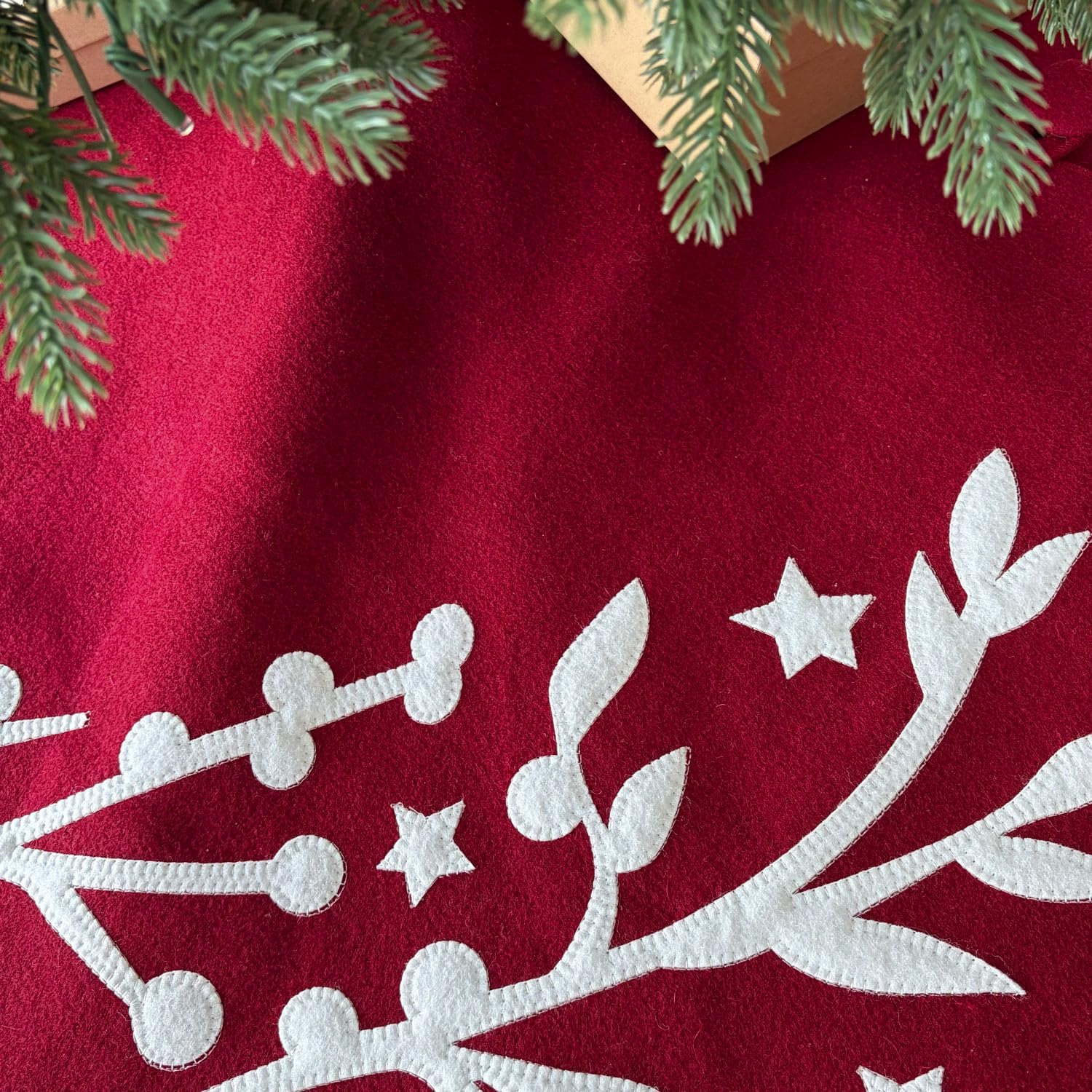 60-Inch Western Wool Felt Christmas Tree Skirt with Stitched Winter Garland Border and Button Closures, Cherry