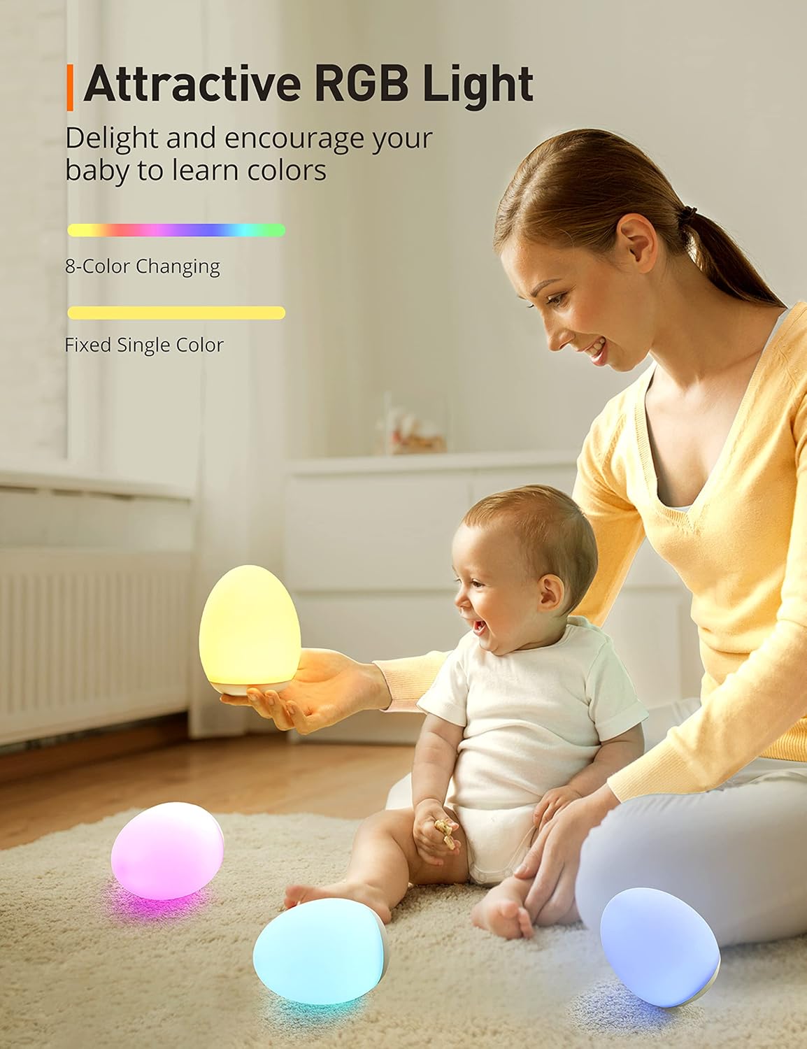 Mother and baby interacting with the JolyWell Baby Night Light displaying various RGB colors.