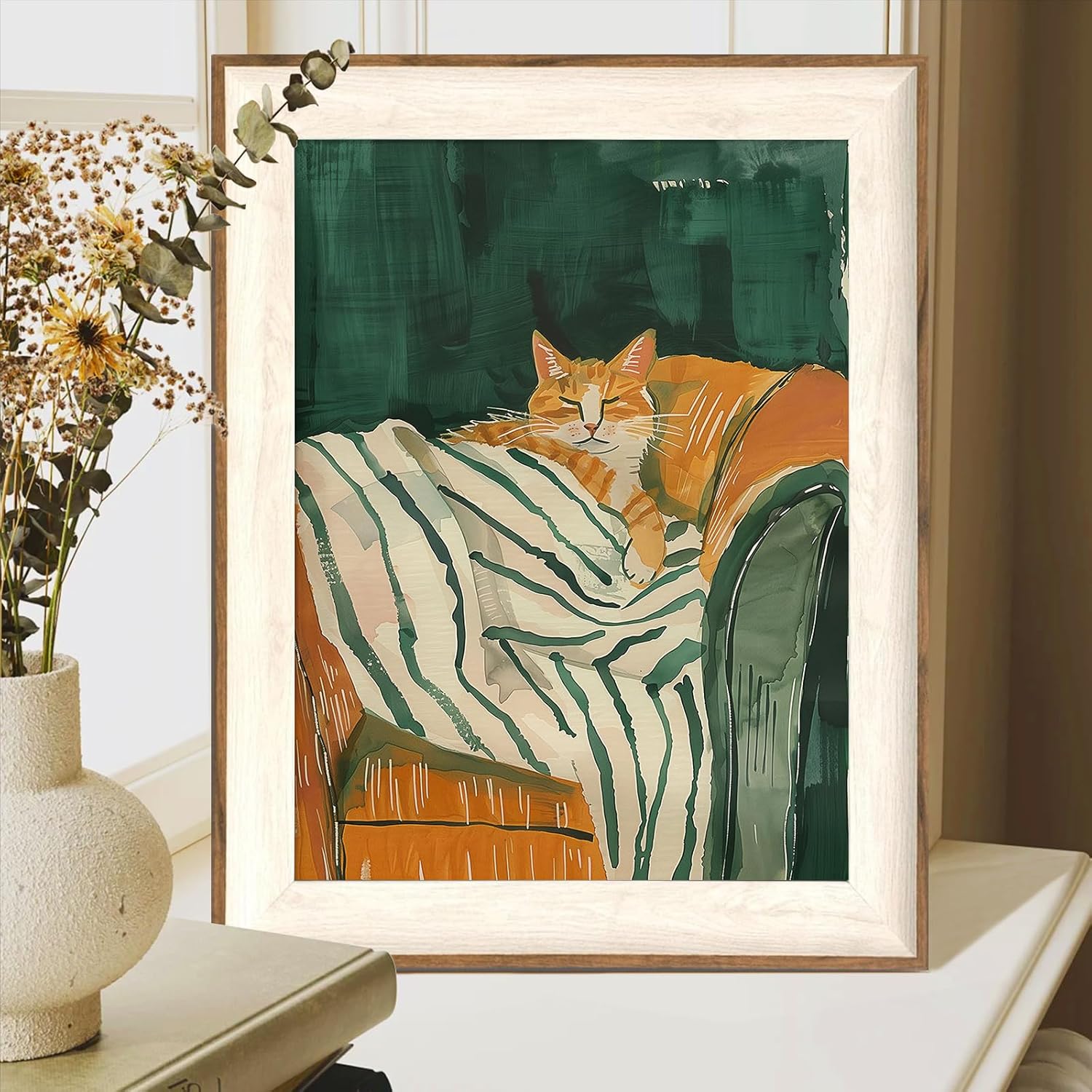 ASTRDECOR Minimalist Framed Wall Art - Cozy Cat Sleeping on Couch with Vintage Green & White Striped Blanket, Trendy Cute Orange Cat Canvas Posters, Modern Aesthetic Bedroom Apartment or Living Room Décor 12x16Inch
