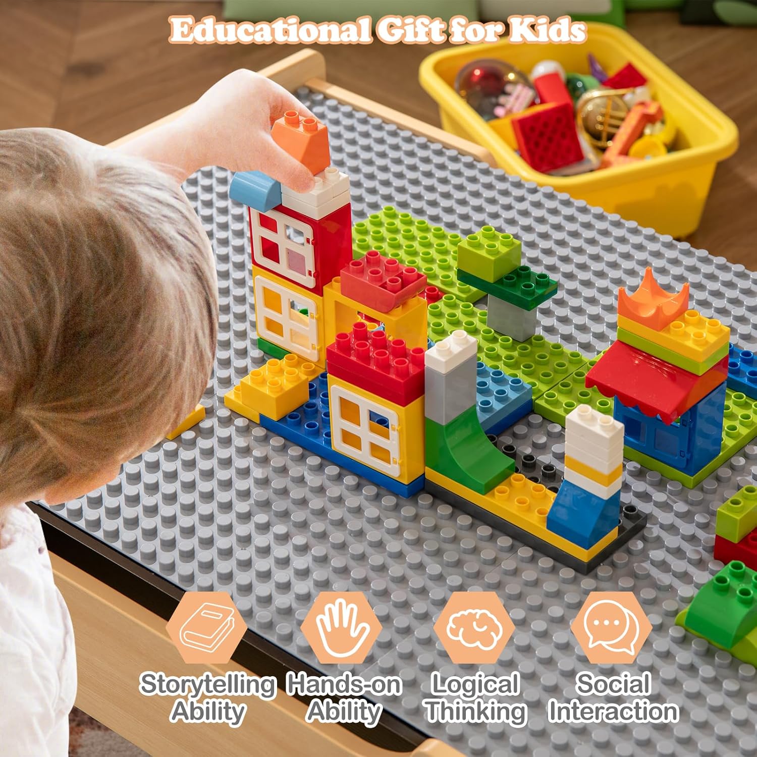 Child playing with building blocks on the dedicated building block surface of the HONEY JOY Activity Table, demonstrating educational benefits.
