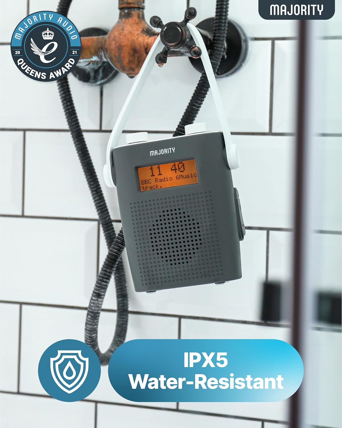 Majority Eversden radio hanging in a shower, demonstrating its IPX5 water-resistant feature.