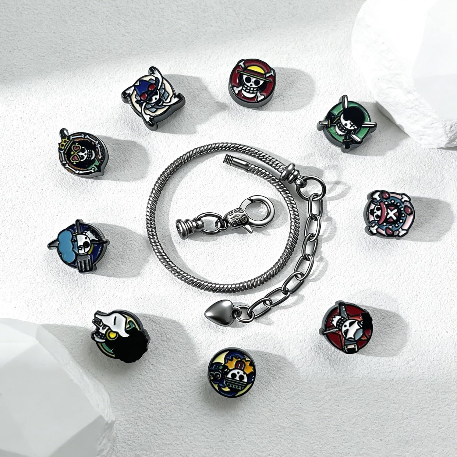 AmaaLeaf OP Charm Bracelet Gift Set 9 Anime-Style Mini Chibi Skull Faces, Luffy, Zoro, Nami, Sanji, Usopp, Robin & More, Removable Alloy Chain for Fans