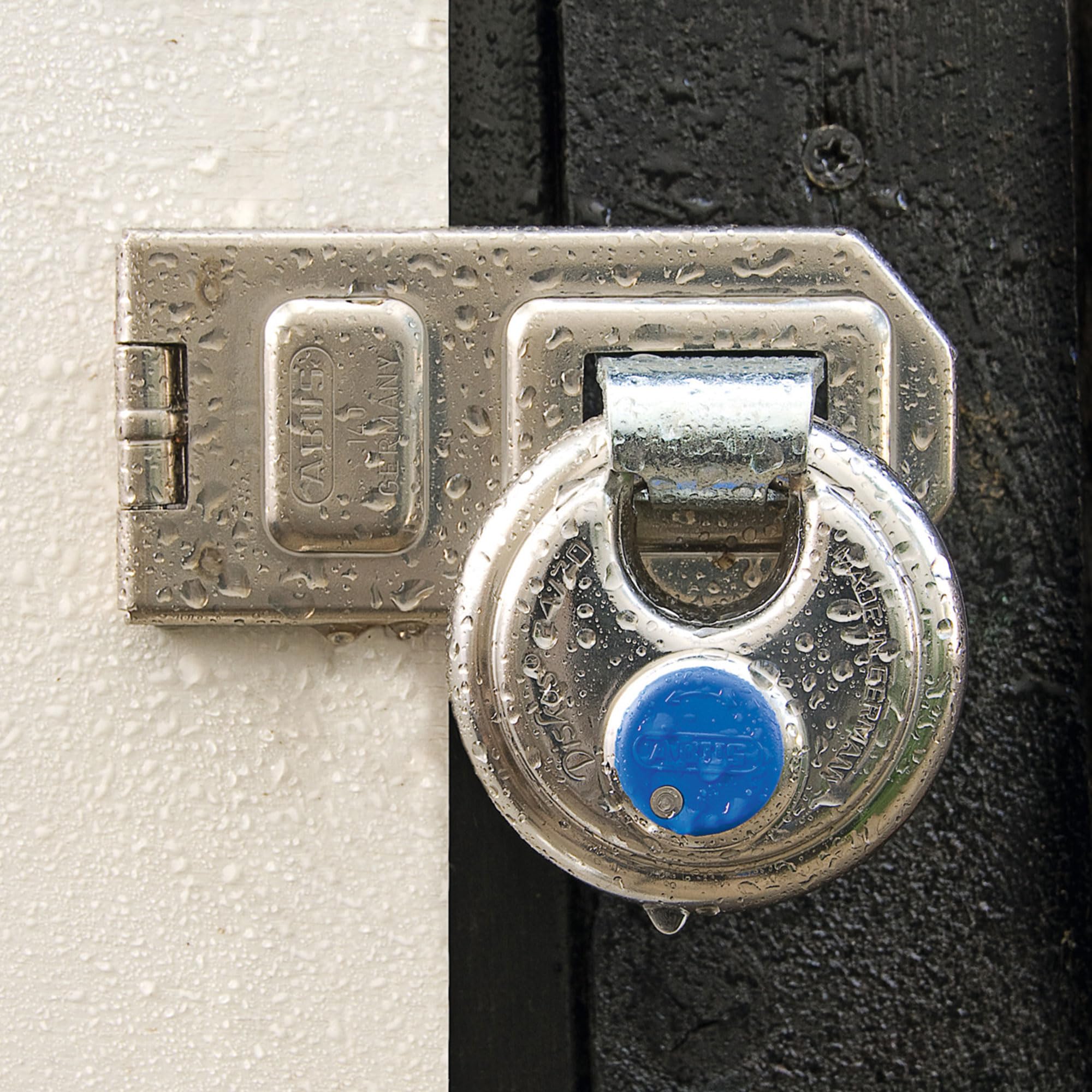 ABUS Cadenas Diskus 24IB/70 en acier inoxydable - avec protection circulaire de 360° - résistant aux intempéries - 02050 - Niveau de sécurité 8 - Argent/Bleu