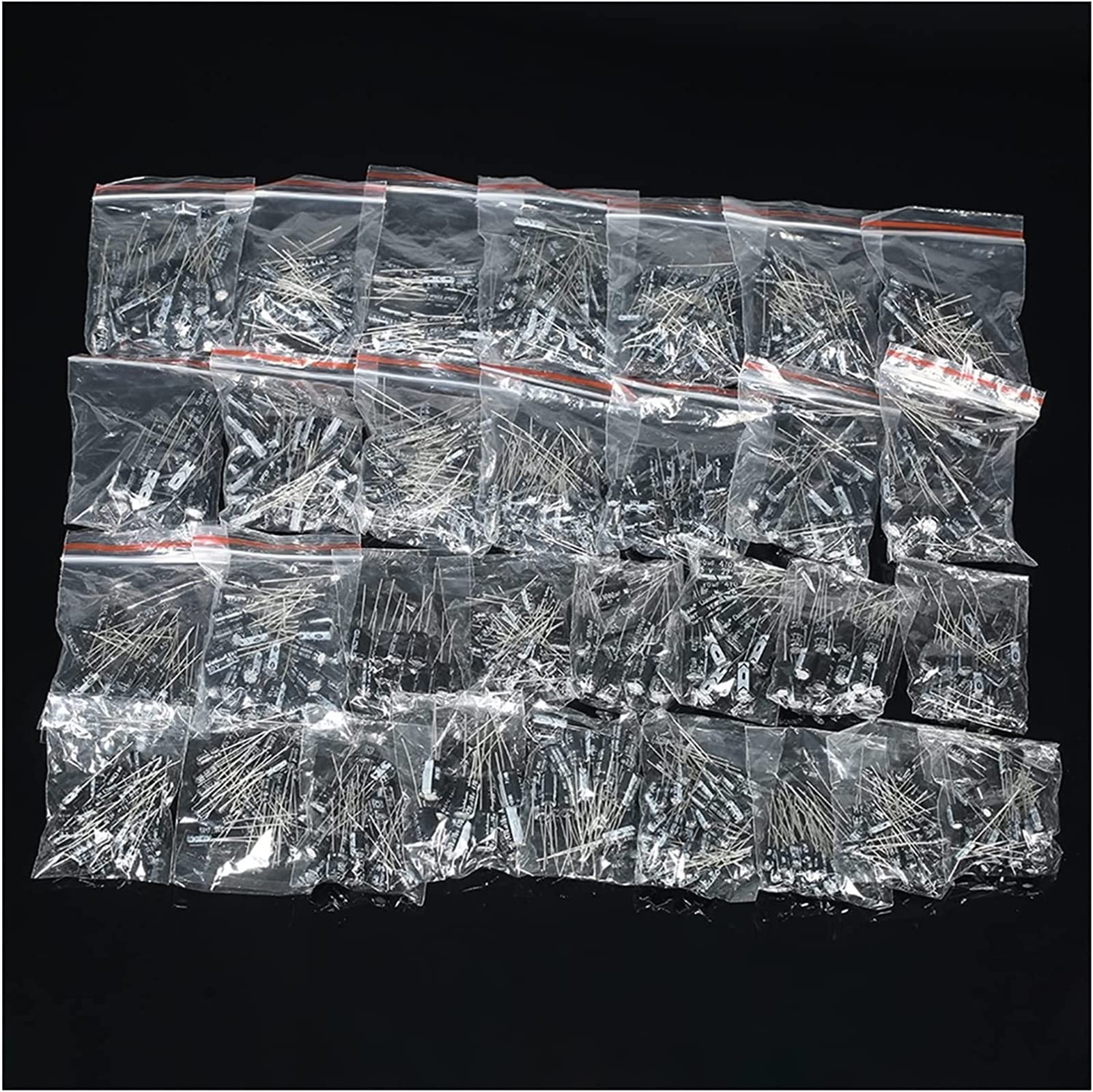 Accesorios electrónicos Kit de condensadores 900 piezas Kit de 30 valores 0.1uF-1000uF Condensadores electrolíticos Conjunto surtido Kit de condensadores 10V 16V 25V 50V Condensadores de mezcla Sumini