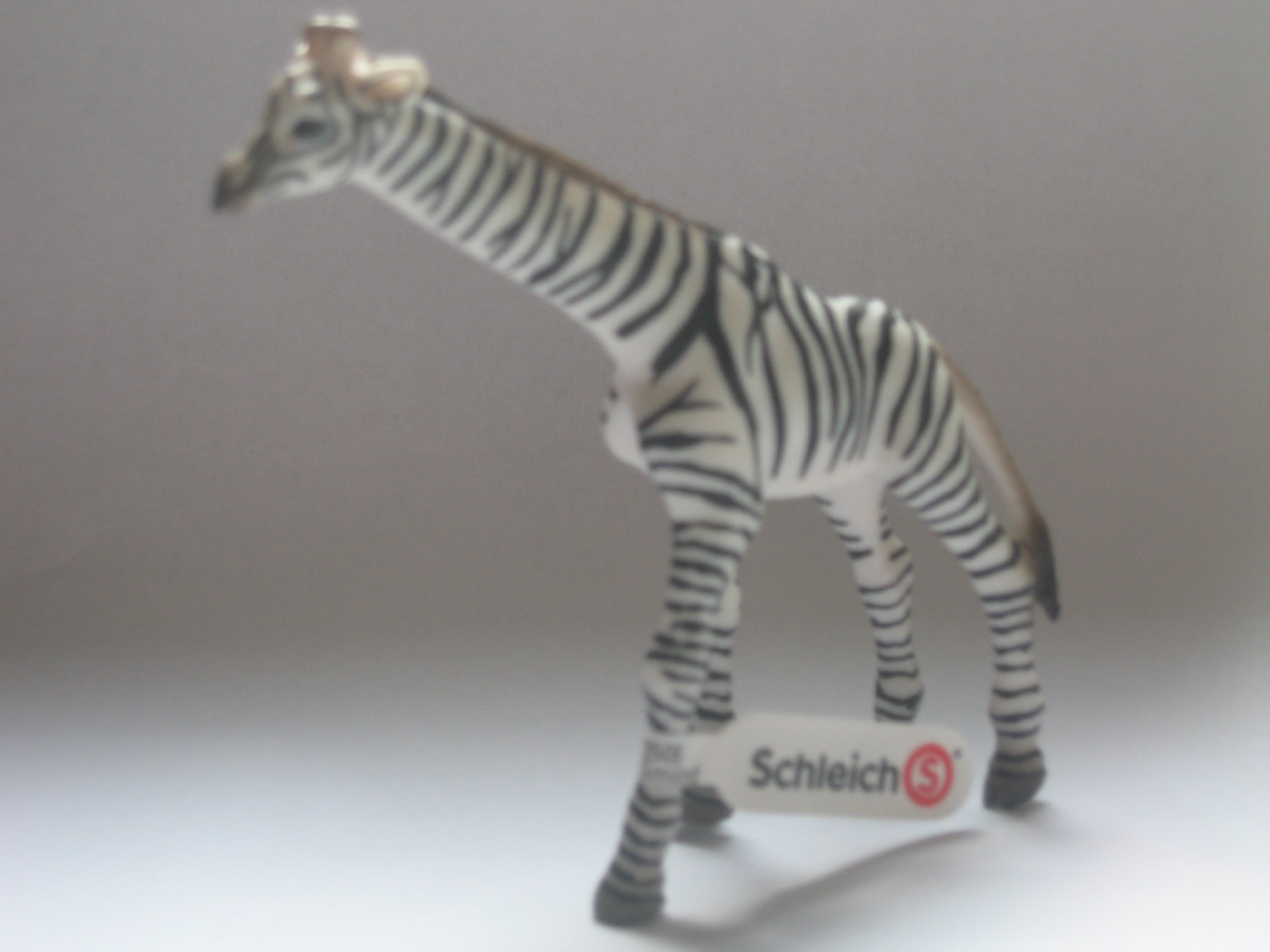 Schleich 82803 chłopiec żyrafy wzór zebry sedycja jubilowa