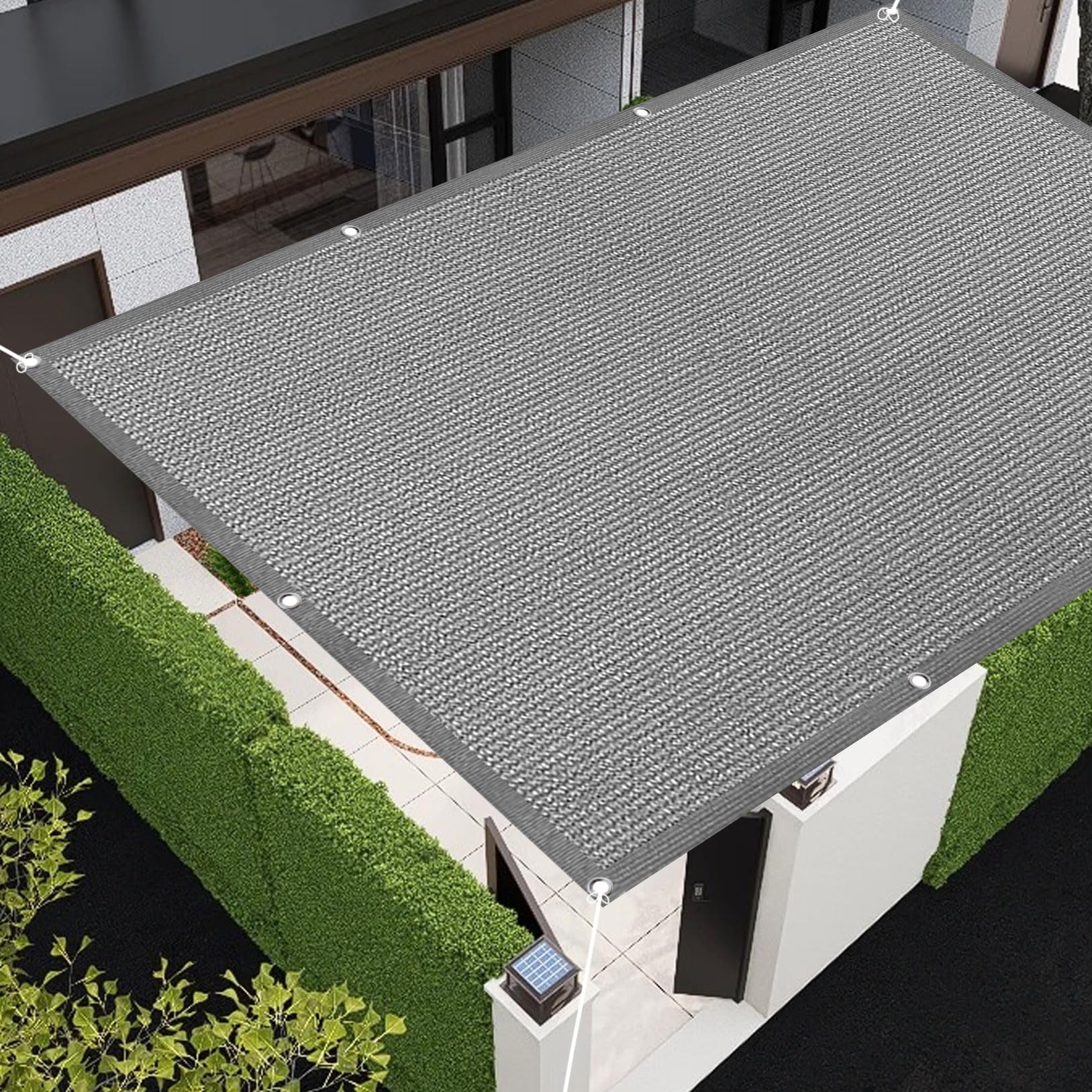 Voile d'ombrage contre la chaleur sur la terrasse tissu résistant perméable gris