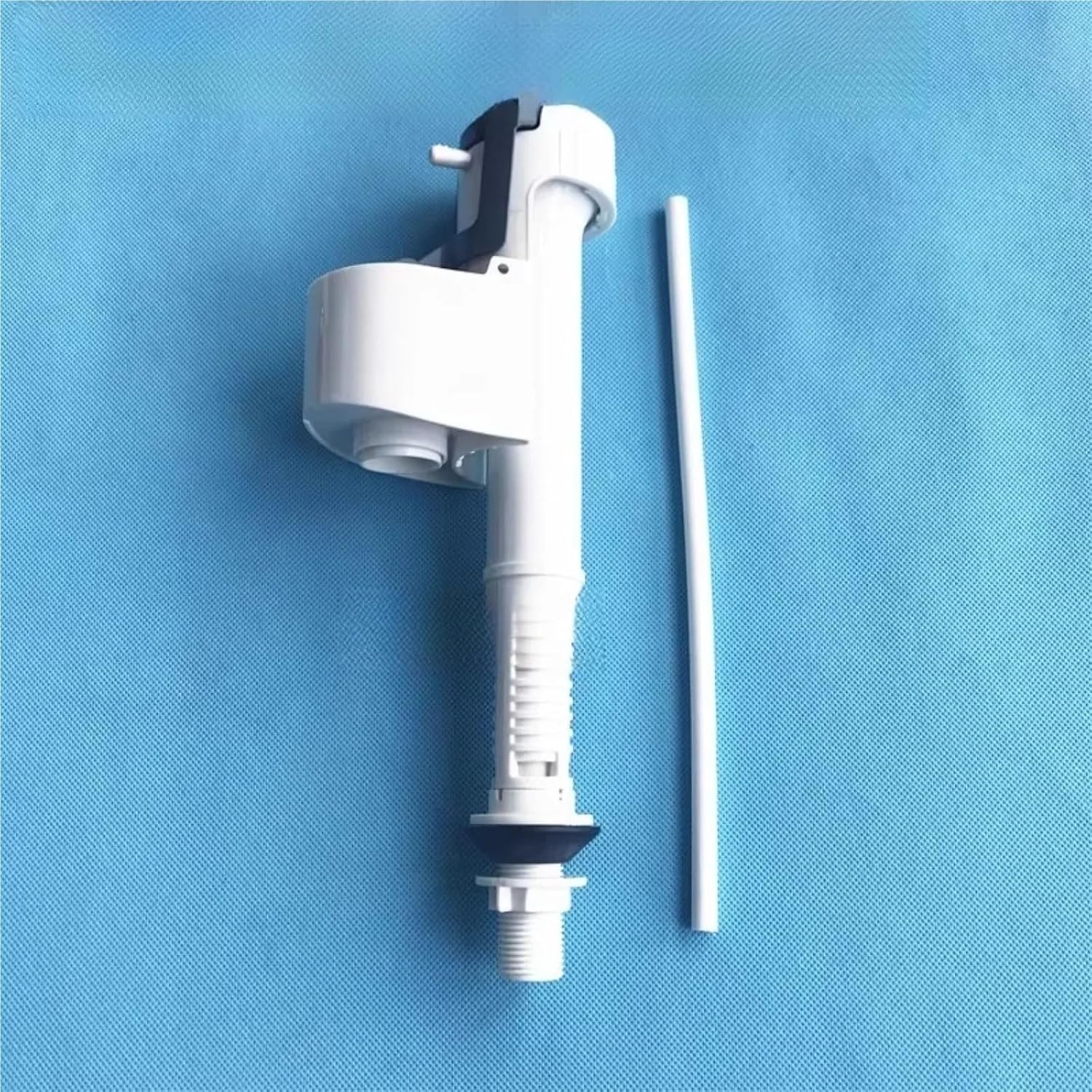 Toilet Tank Repair Kit with Inlet Valve, Drain Valve, Push Button, and Hardware.