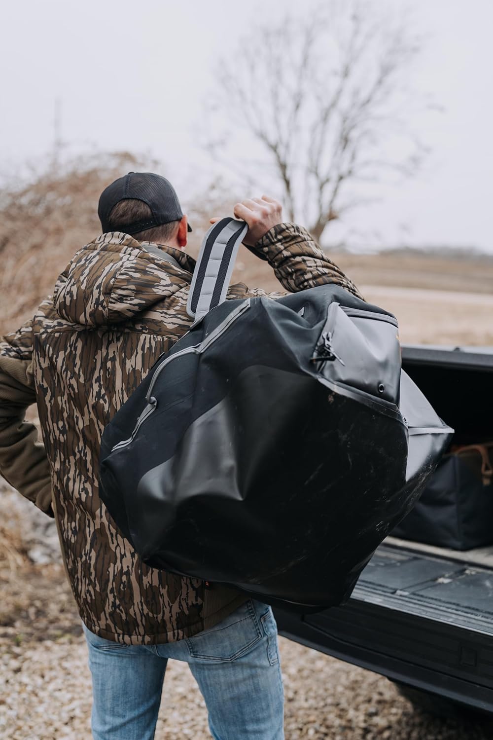 Muddy Outdoors DV8 100L Waterproof Duffle Bag Black/Peat Moss