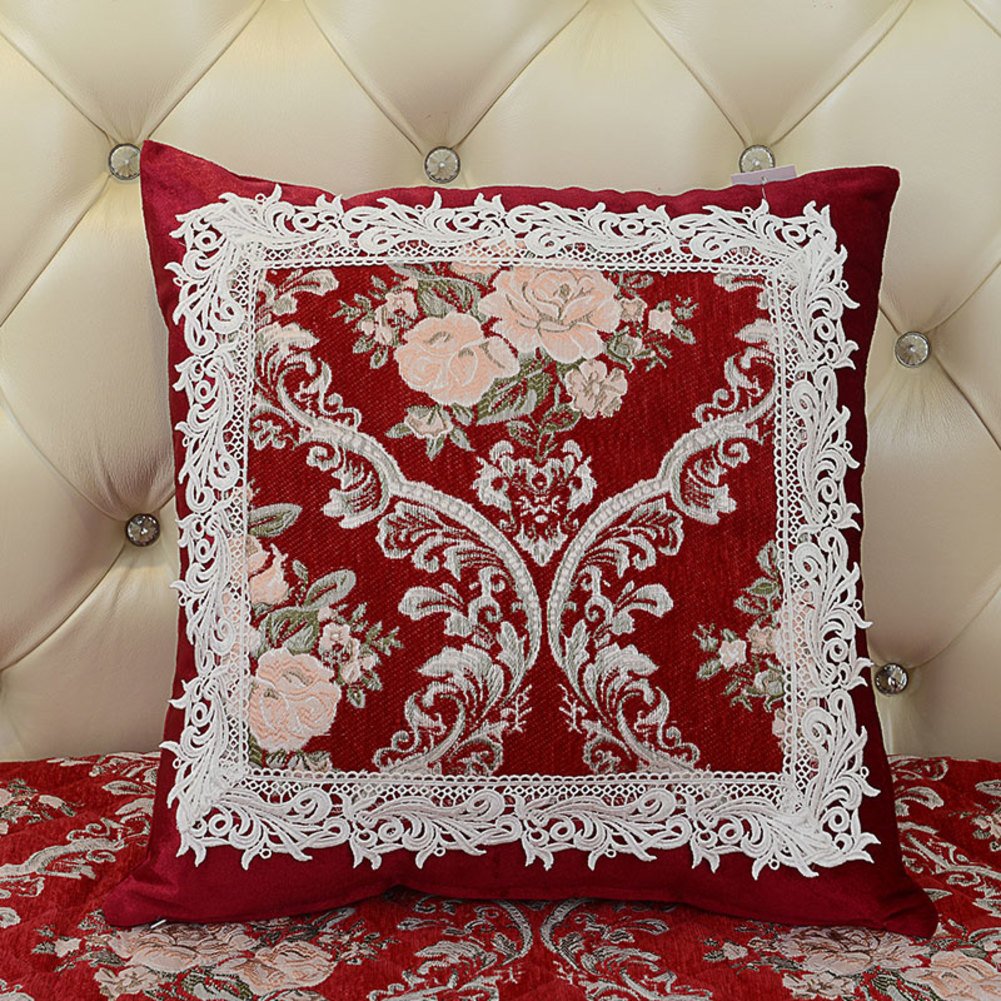 Oreiller lombaire tissu fleurs contre le mal de dos sur canape