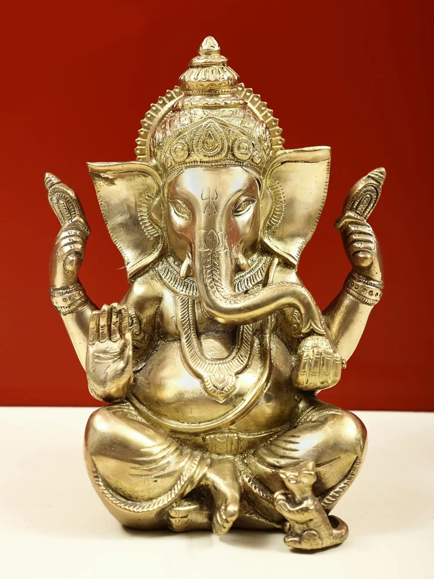 Ganesh assis en laiton Royal Kurta résout le manque d'authenticité de vos meubles