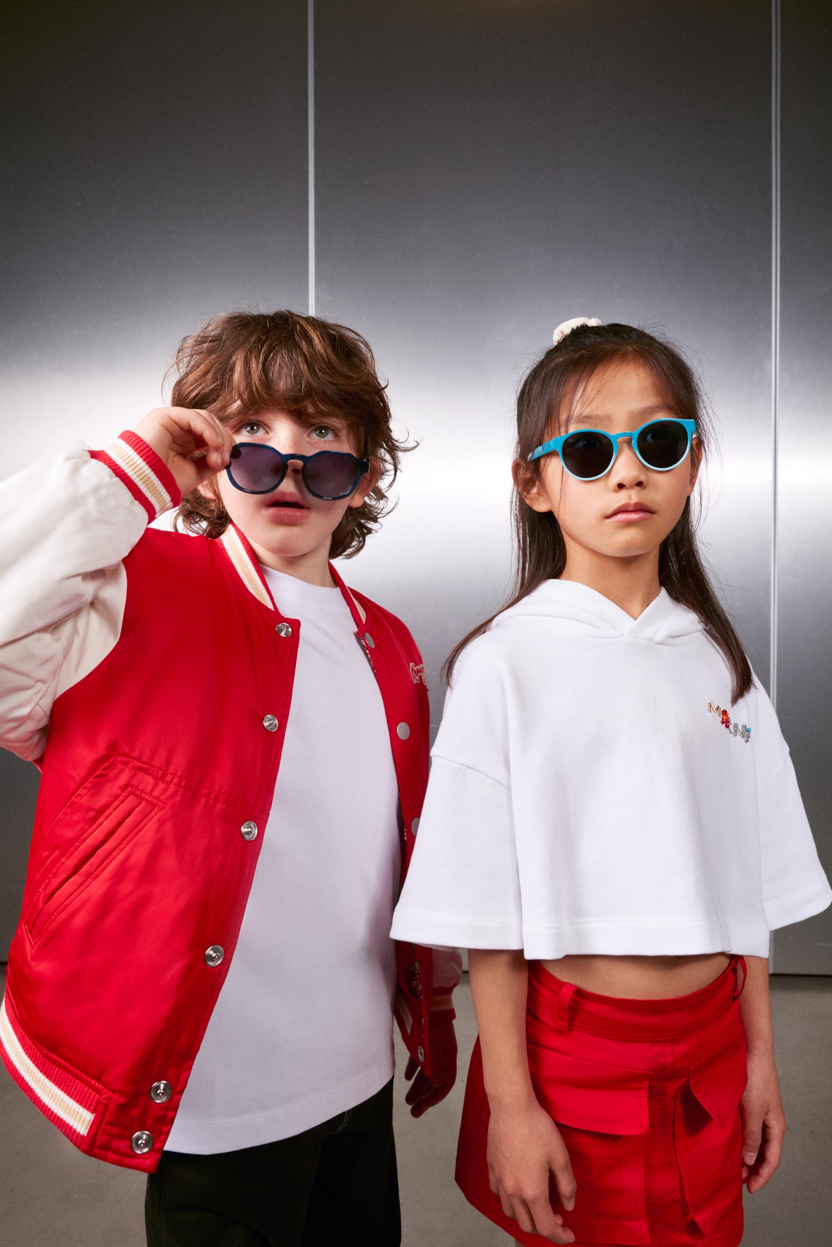Hawkers Dziecięce okulary przeciwsłoneczne Belair Kids Ø 42 mm pomarańczowe