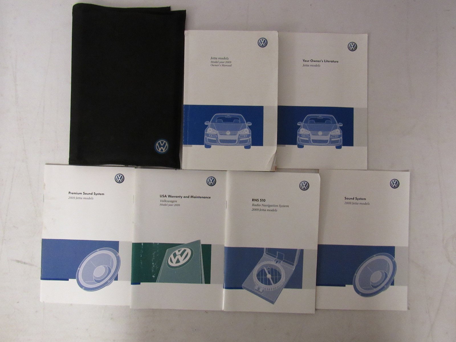 Black fabric case containing the Volkswagen Jetta owner's manual