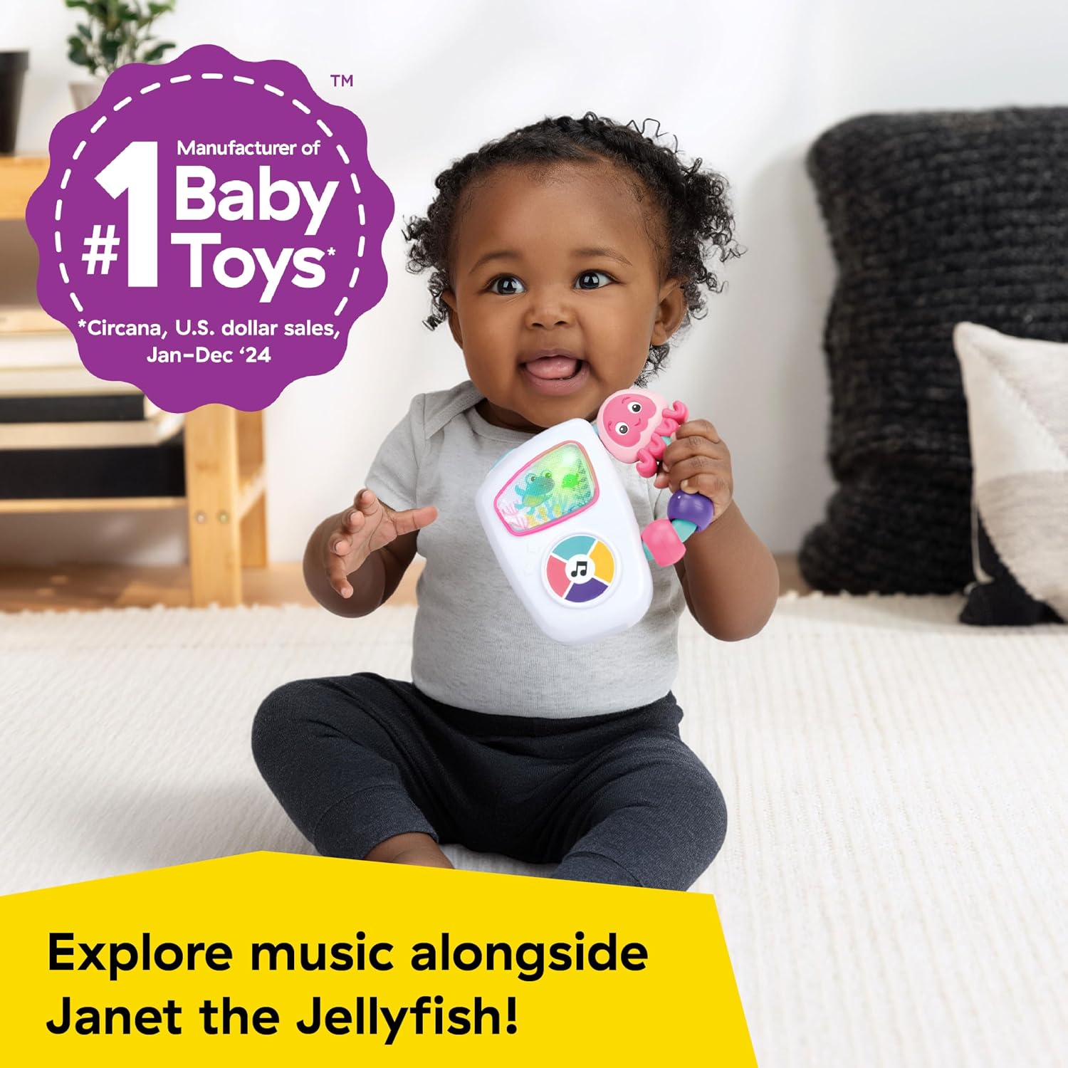 Baby playing with the Jammin Janet musical toy