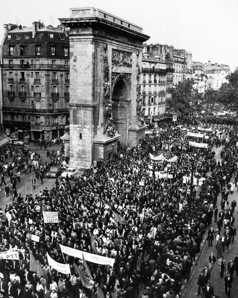 France Strike 1968 Nworkers Participating In The General Strike Pass The Porte Saint Denis While Marching Down Boulevard Saint Denis On The Right Bank In Paris 24 May 1968 Poster Print by (18 x 24)