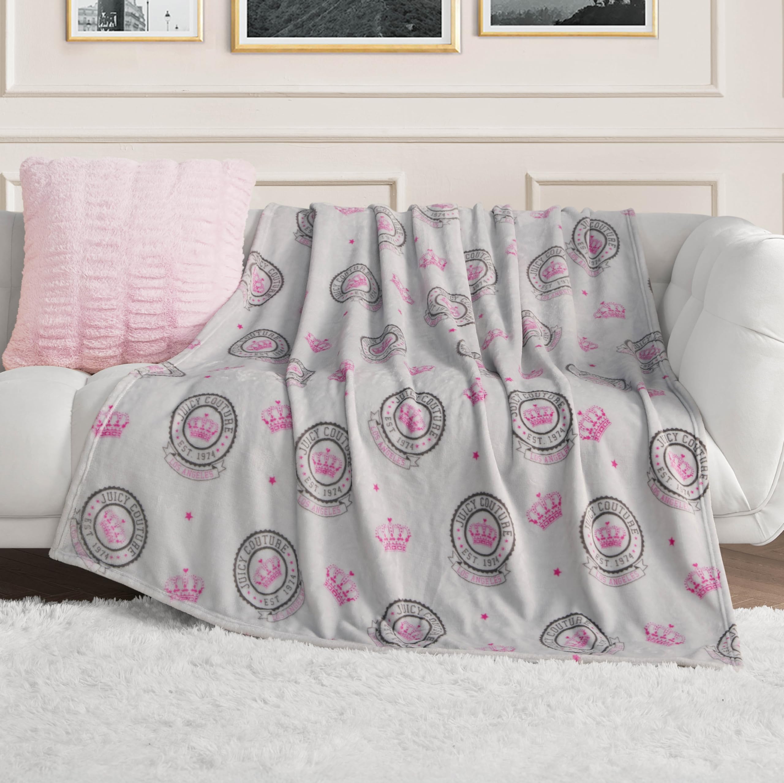 Juicy Couture – Throw Blanket | Juicy Emblem | Plush and Cozy | Decorative Blankets for Sofas, Chairs and Beds| Luxurious and Soft | Chic Home Décor | Measures 50” x 70” | Pink/Black/White