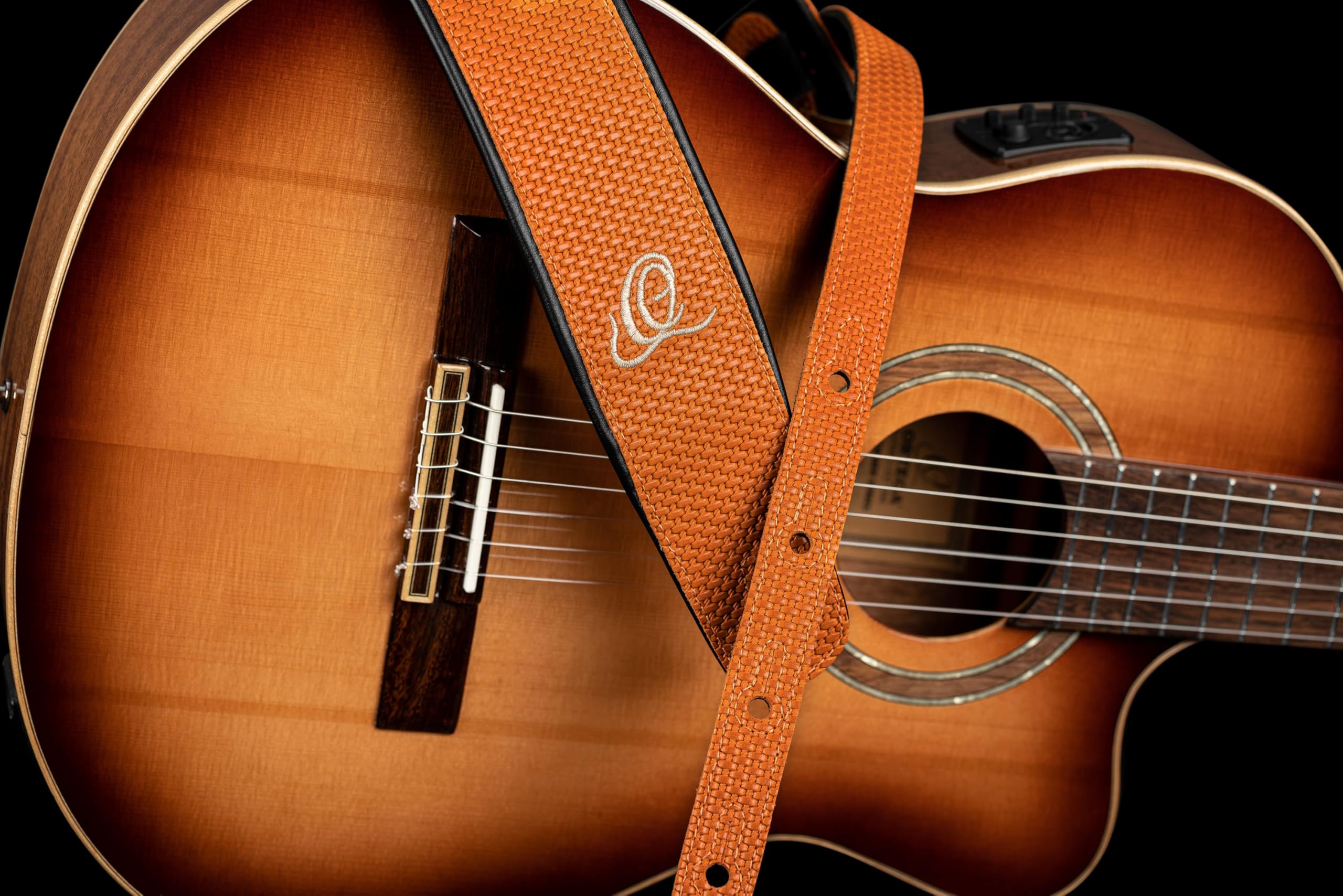 Ortega Guitars Gitarrengurt Länge Verstellbar - Akustik Gitarre / Bass, E-Gitarre, E-Bass - Custom Series - Echtleder, Orange Braid (OSCU-6)