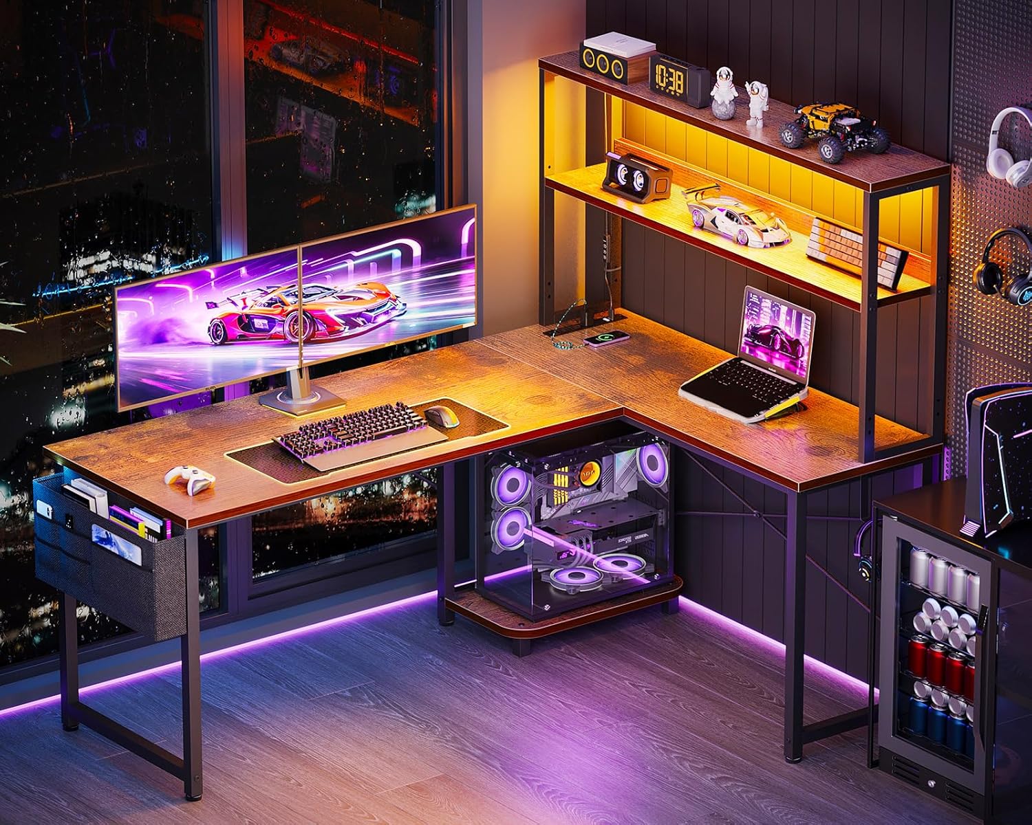 ODK 53 Inch L-Shaped Desk in a modern room at night, illuminated by its LED lights, showcasing a dual-monitor gaming setup.