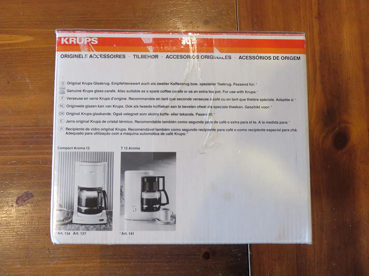 Enrere view of KRUPS replacement carafe packaging with multilingual information