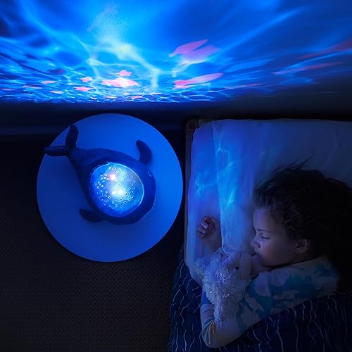 Miniatura 9 de Angelcare Bobbi The Whale Proyector de luz nocturna de techo para bebés y niños, chupete de sueño con canciones de cuna de volumen ajustable, ruidos