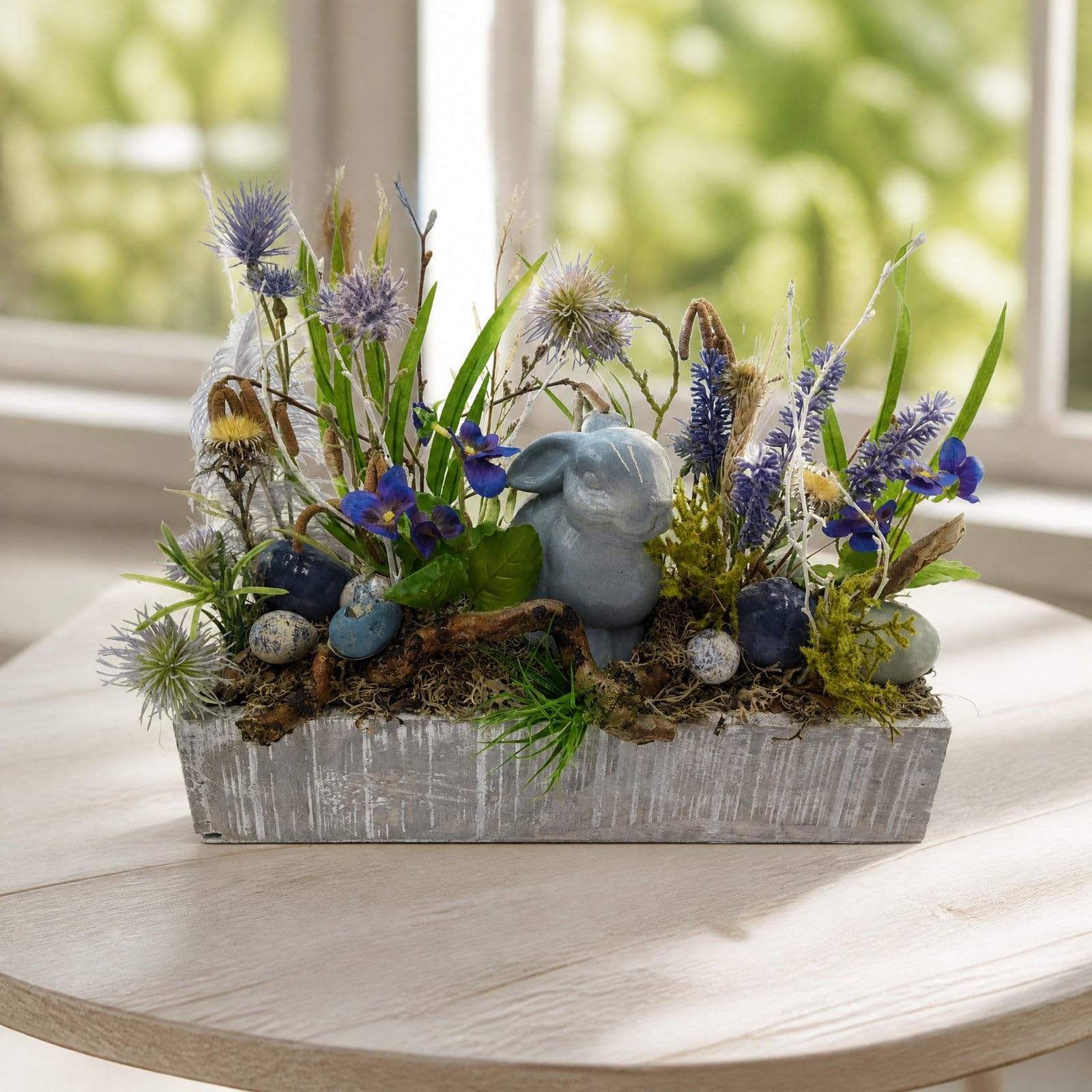 Ostergesteck Frühlingsgesteck Hase Lavendel Eier Distel blau grün