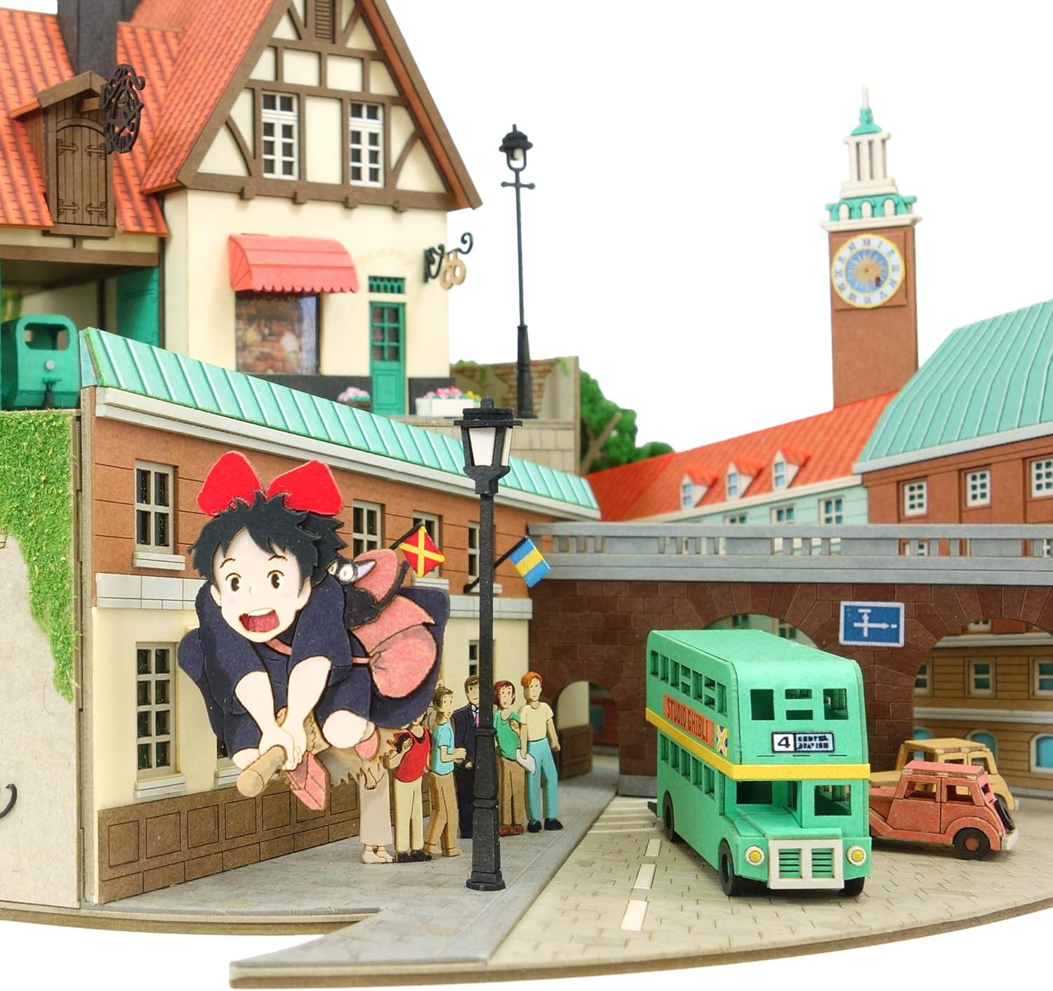 Close-up of Kiki flying near the bus stop in the diorama