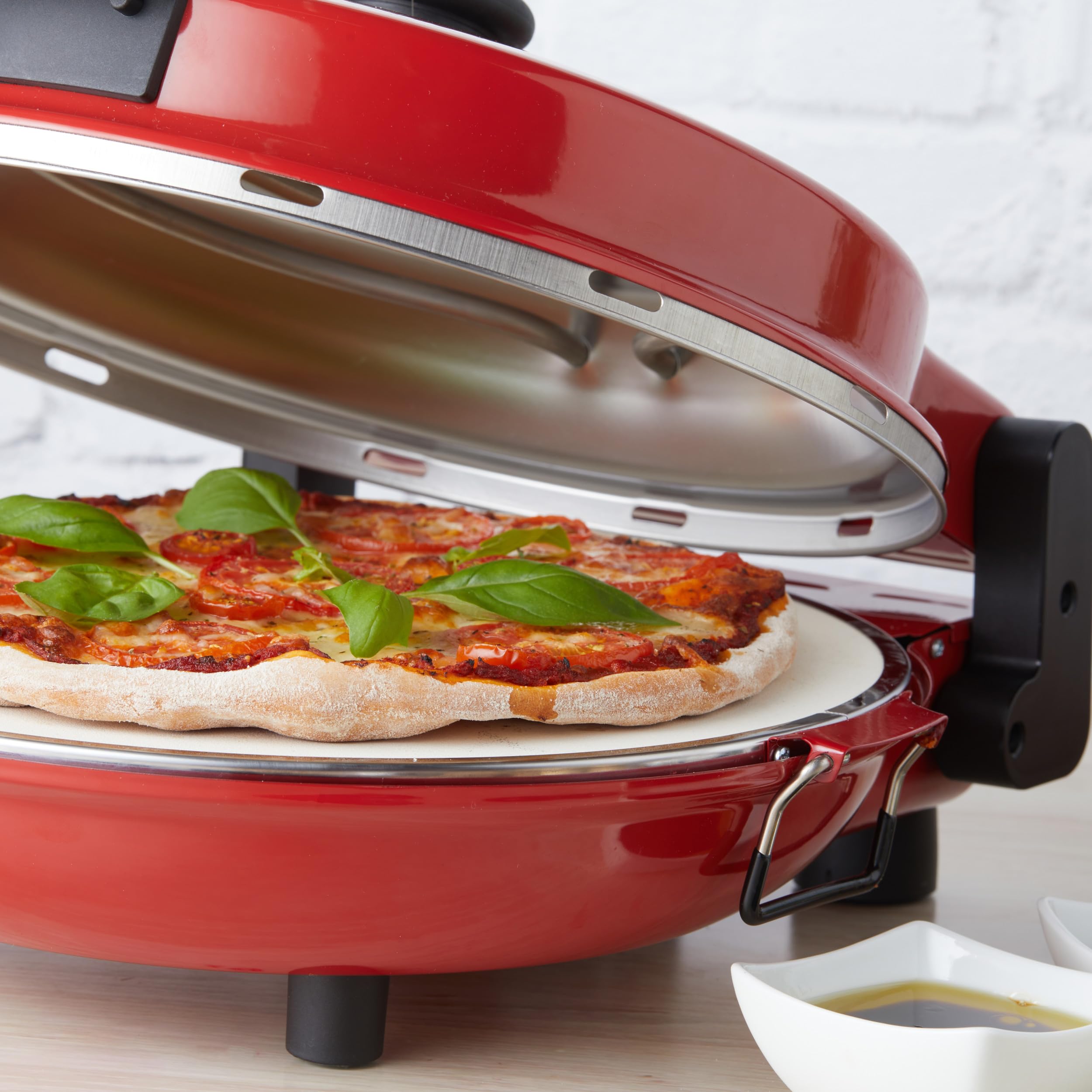 Petra PT5666VDE Horno eléctrico para pizza - interior, 1200 W, 5 niveles de temperatura, precalentamiento rápido, pizzas de 12 pulgadas en 5 minutos, piedra para pizza extraíble, cortador y 2 paletas