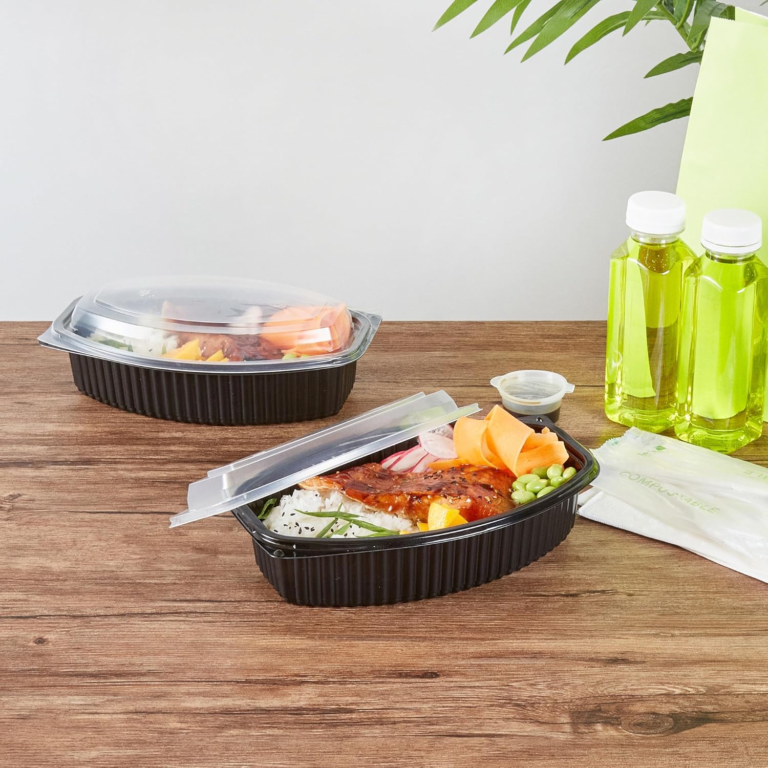 Restaurantware-RW Base 32 Ounce Meal Prep Containers, 50 Microwavable To Go Containers With Lids - Disposable, Freezable, Black Plastic Oval Food Containers, Pack Hot And Cold Food, For Takeaway
